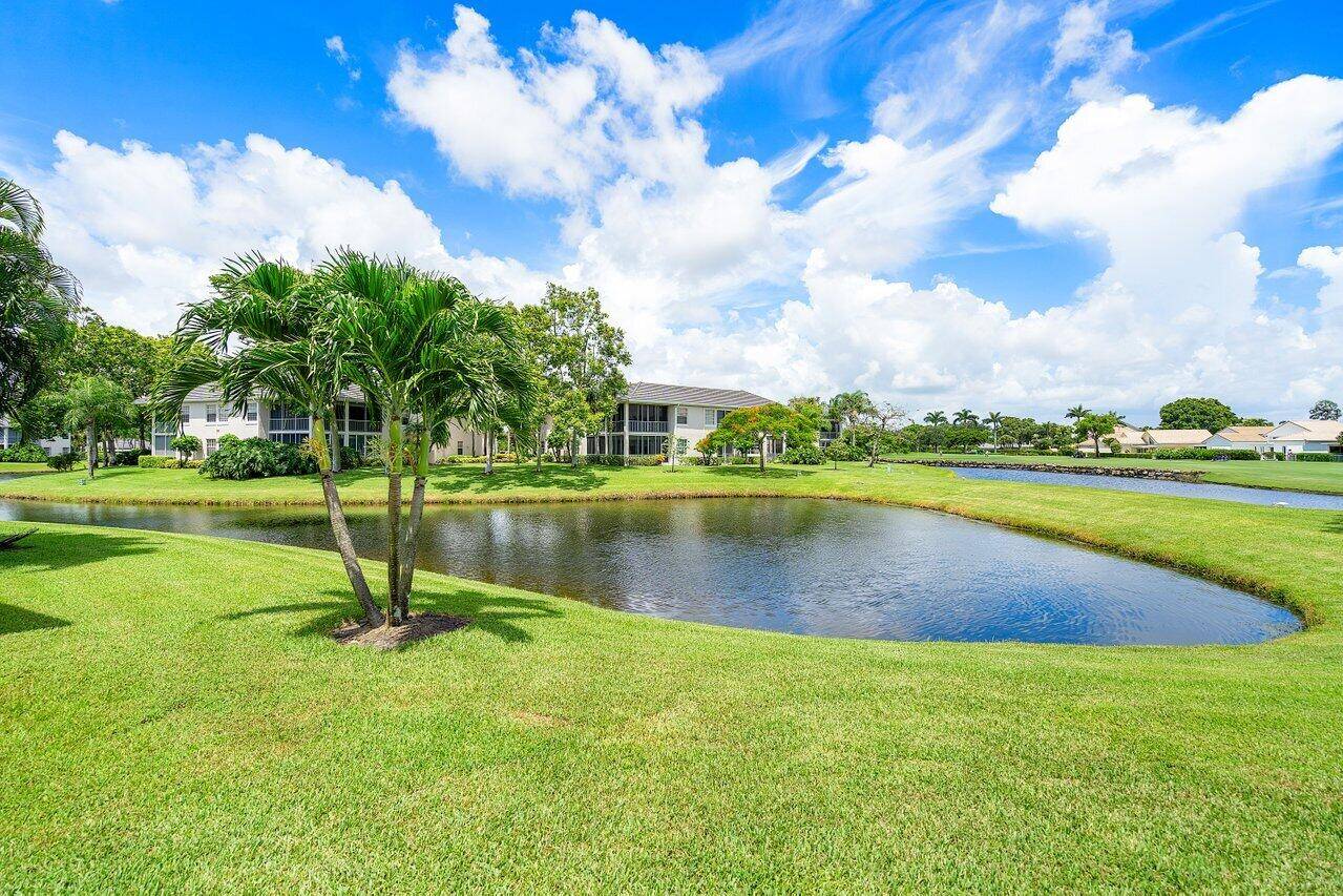 Enjoy the season in this beautiful ground level condo with stunning panoramic lake and golf views !