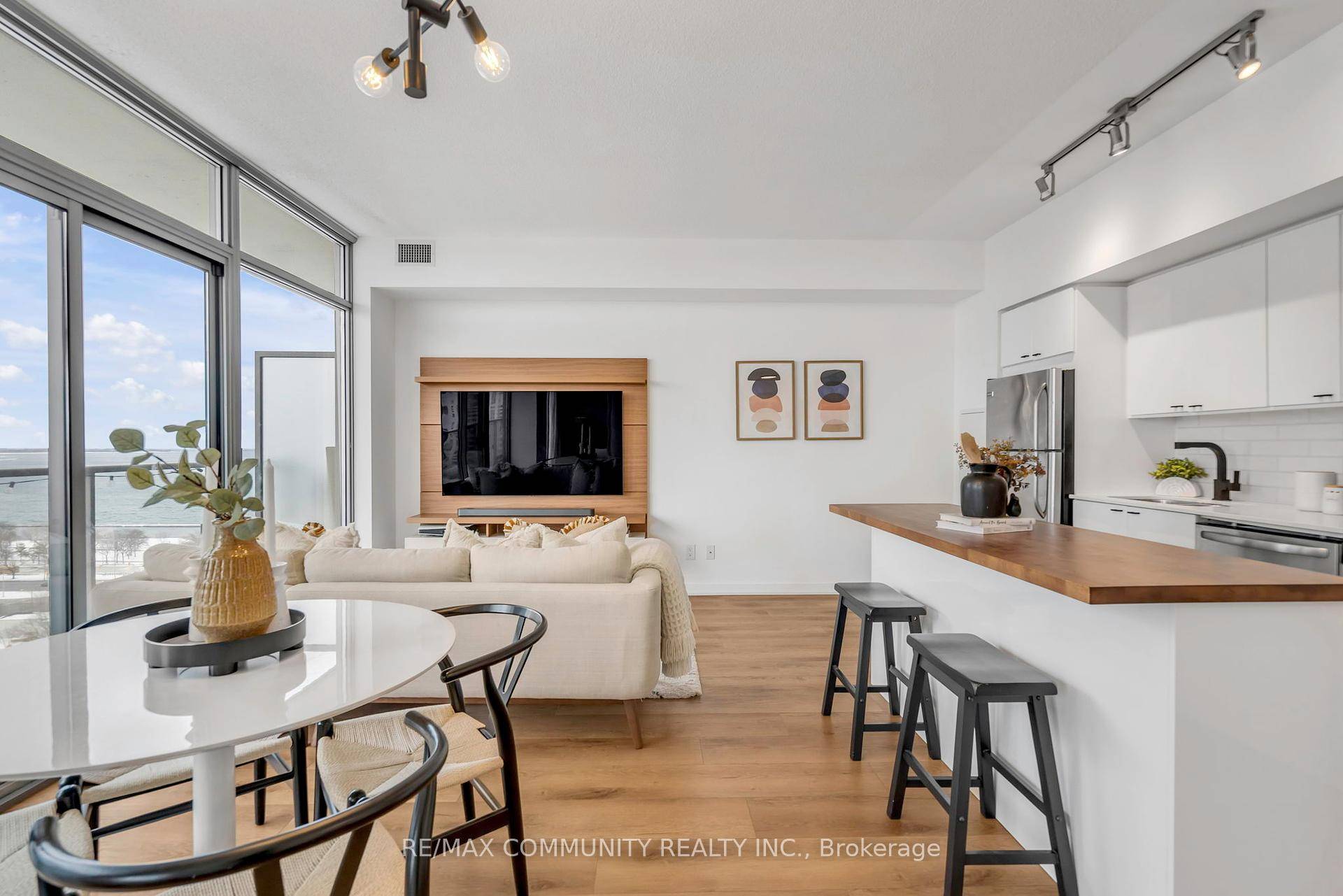 Experience modern elegance, comfort, and breathtaking views in this rare, spacious 1 den condo at NXT Condos.