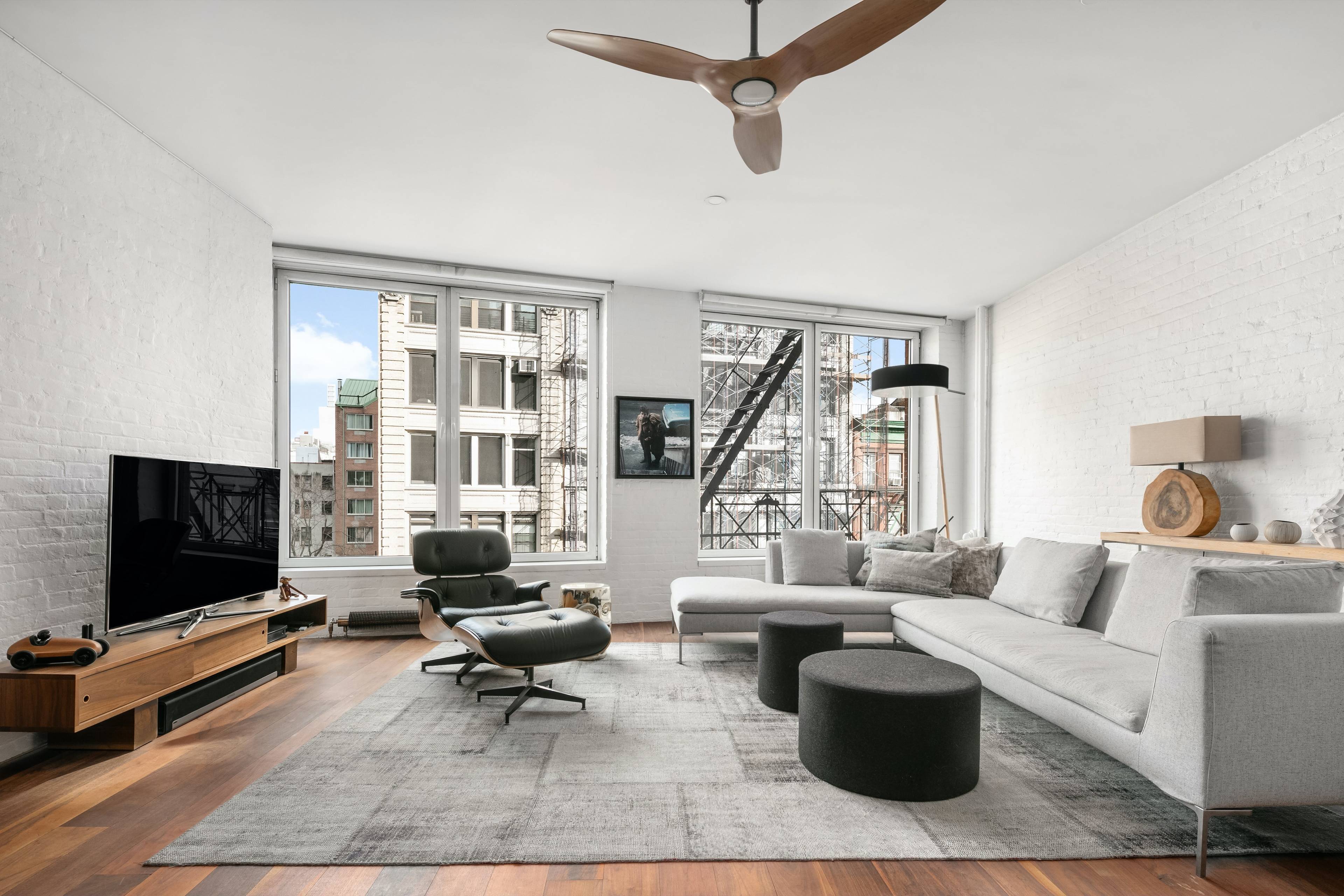 GUT RENOVATED SOHO LOFT complete with original pre war details throughout !