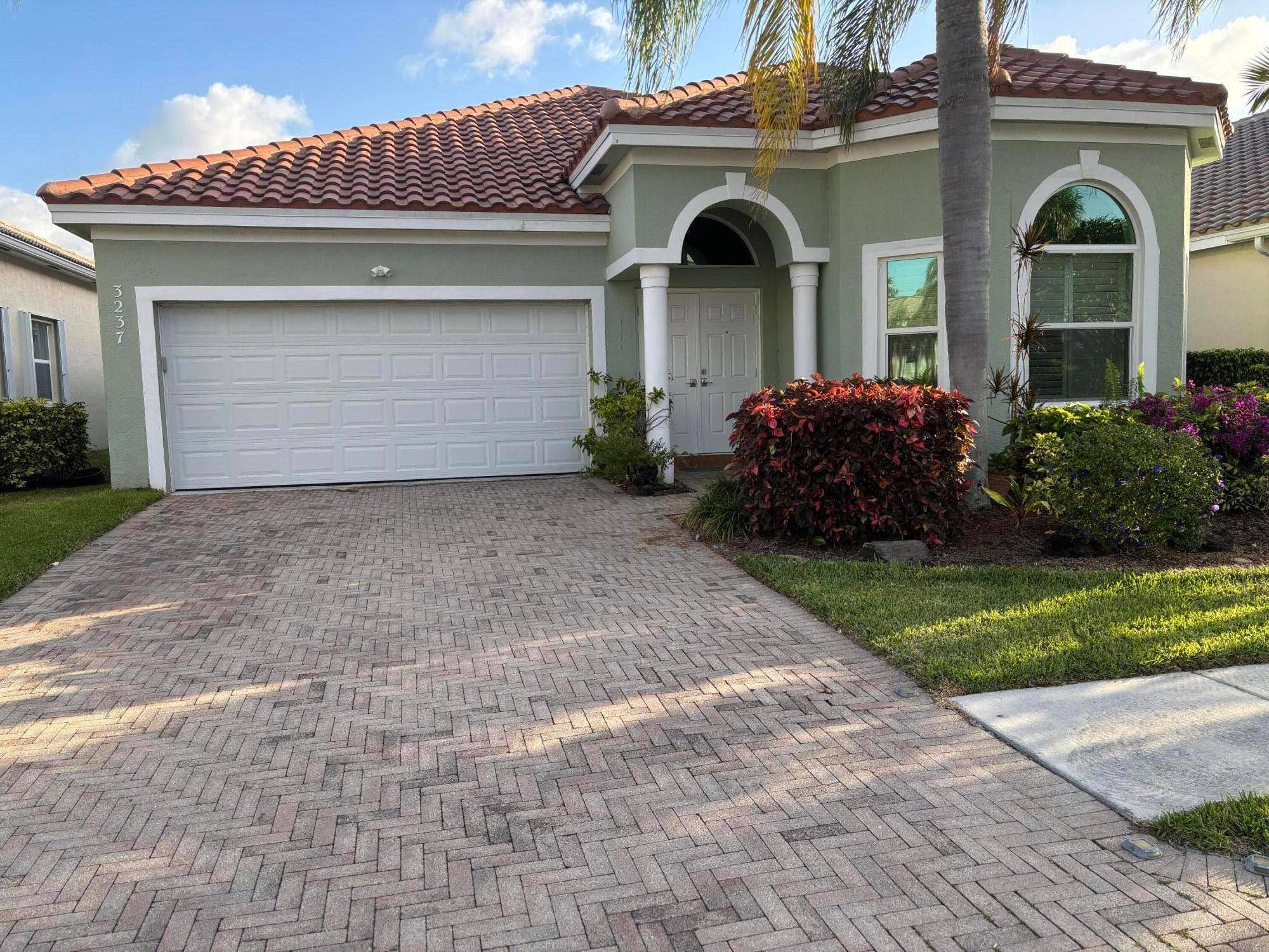 New Roof, New Hurricane Windows, gated community with low HOA fees.