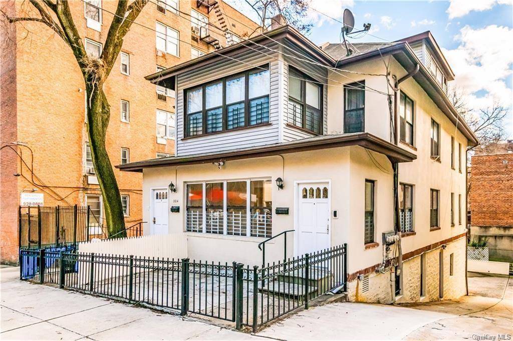 Welcome to 204 W 260th Street, a marvelous three family home sitting on a generous lot in the heart of Riverdale.