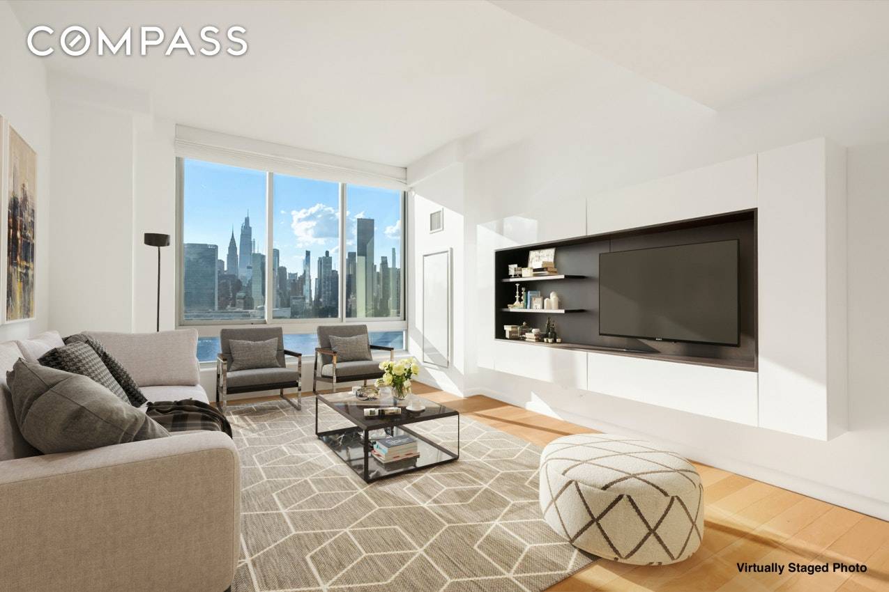 This sprawling sun drenched one bedroom home boasts the most amazing unobstructed city and water views directly from your own living room and bedroom.
