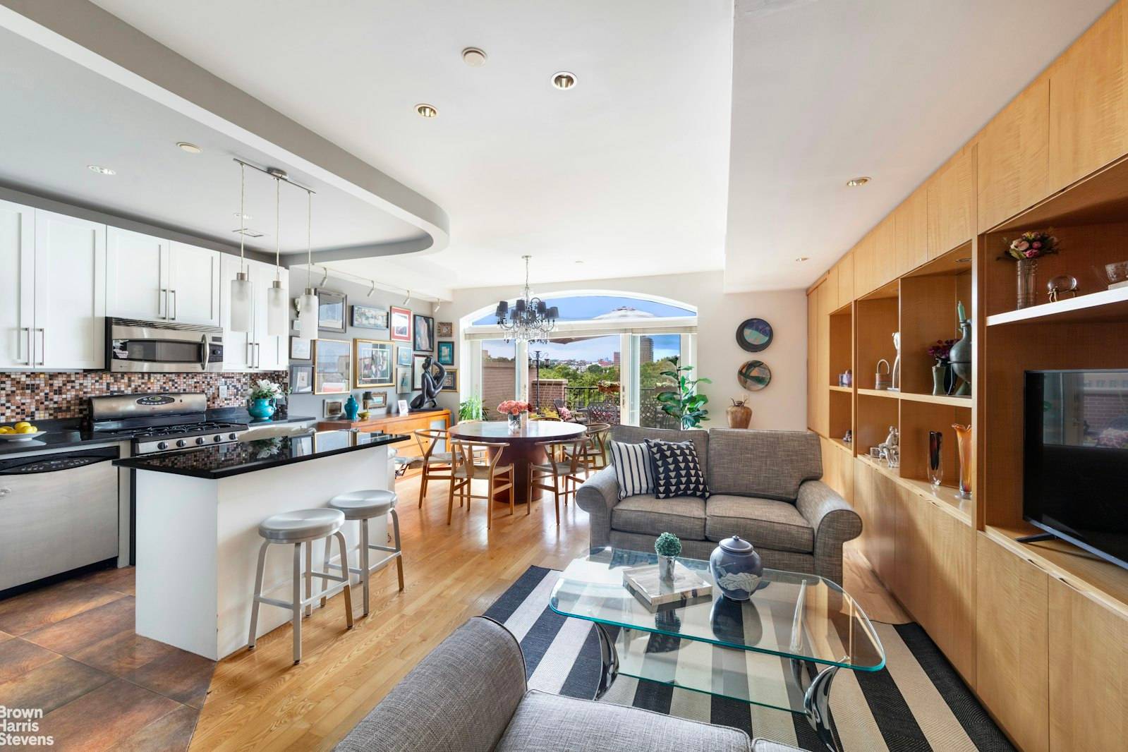 A Park Slope two bedroom condo that enjoys a huge south facing terrace with incredible park and city views, a 2nd balcony, and a tax abatement !