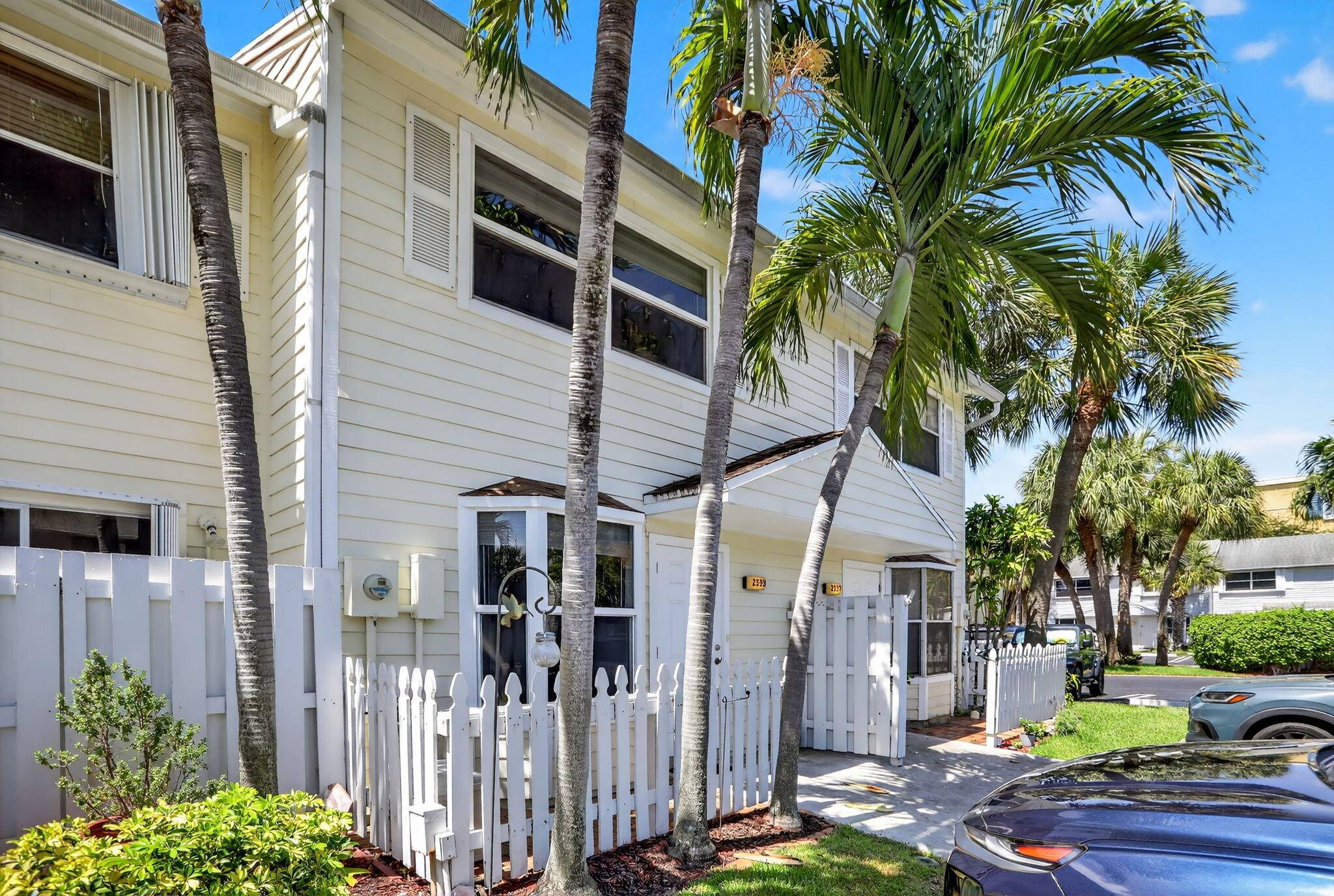 Experience the best of coastal living in this beautifully maintained townhome featuring two spacious primary suites, 2.