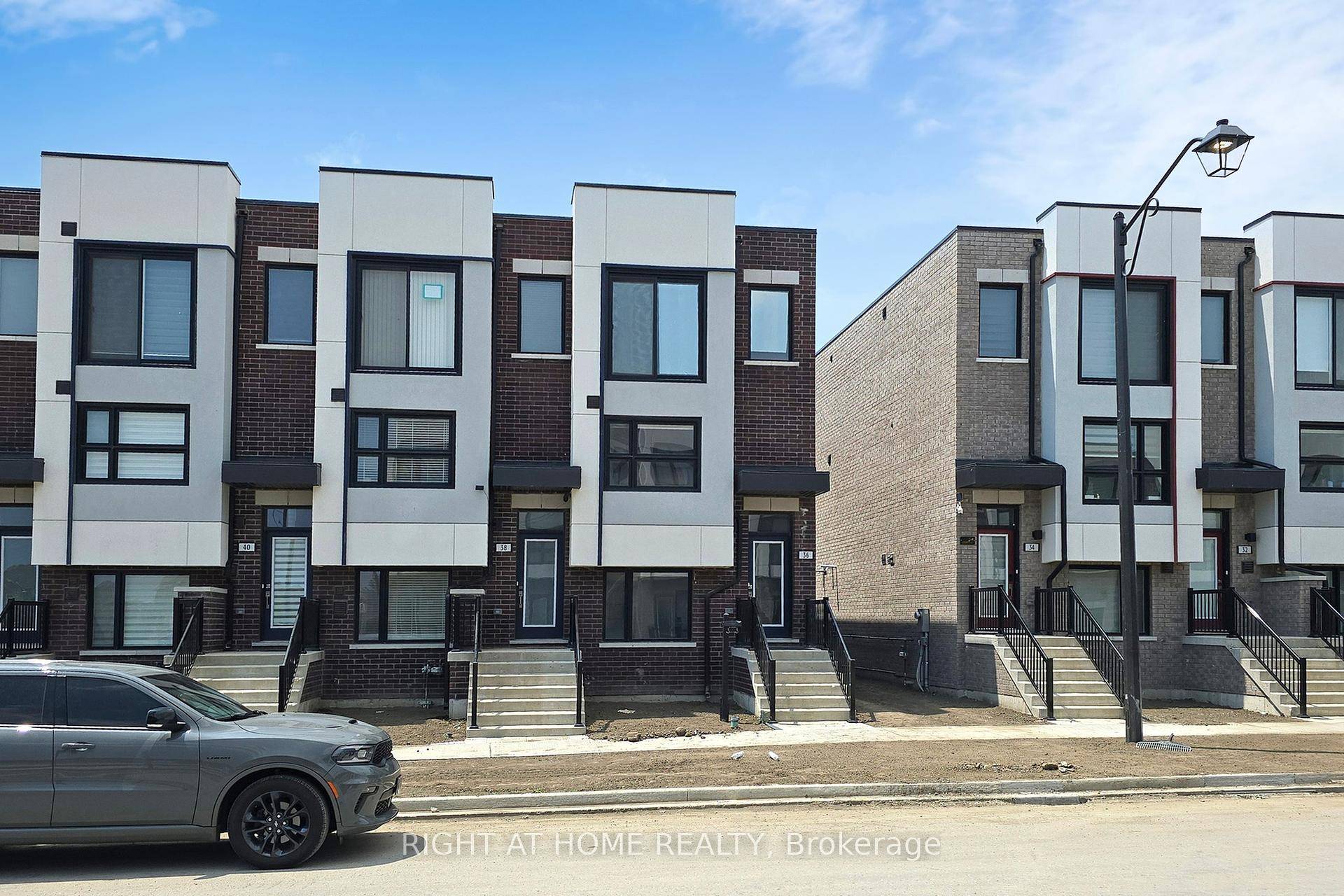 Modern End Unit Townhome in Prime Downtown Ajax Location !