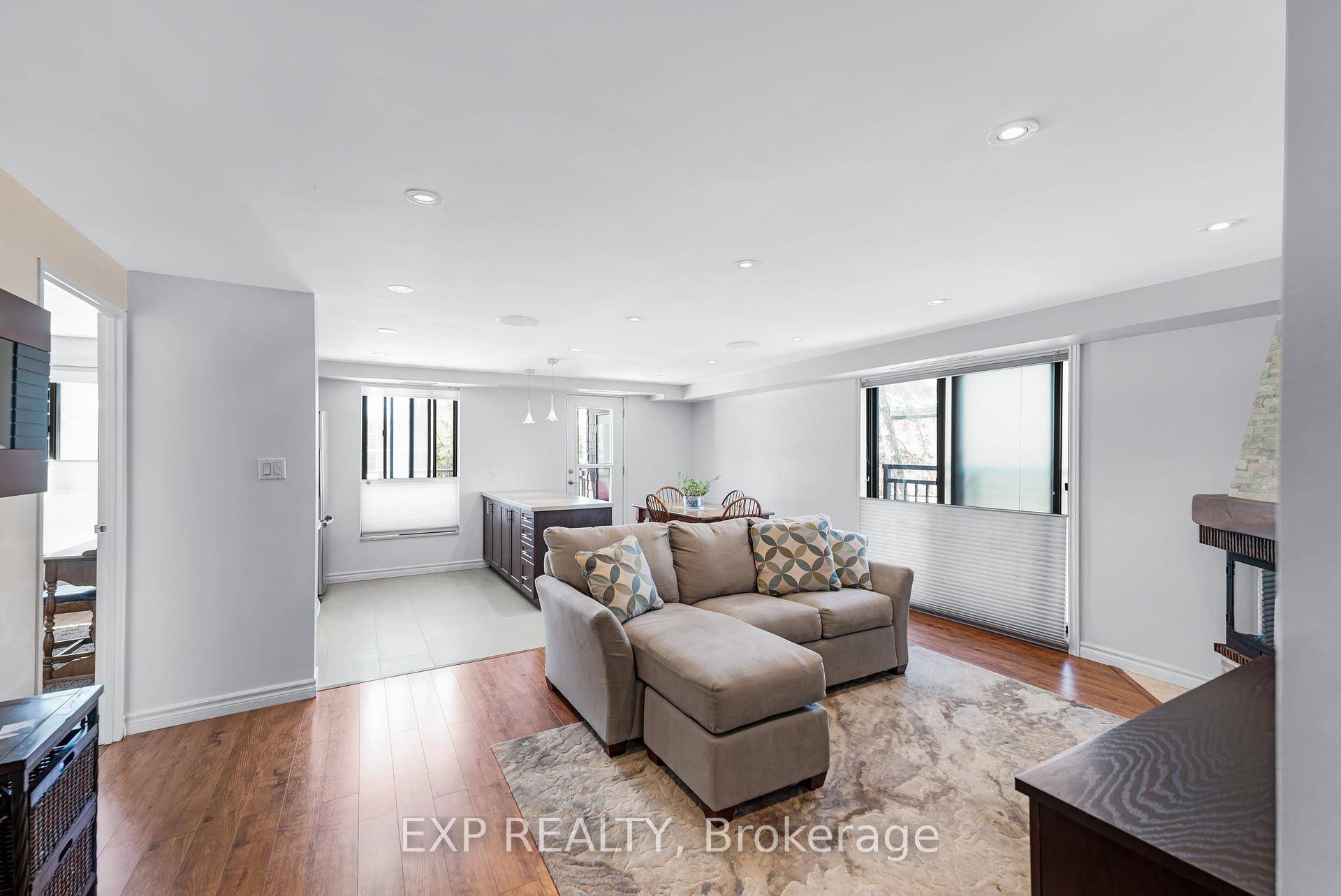 This bright and spacious ground floor corner suite offers almost 1, 200 square feet of living space in a quaint and quiet building in the heart of Aurora.