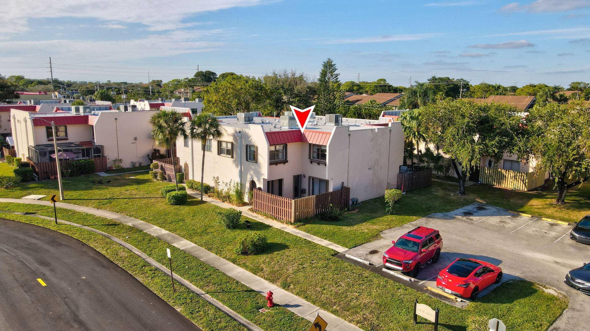 This charming townhome in Greenacres features a newly installed roof and an open, airy layout perfect for relaxation and entertaining.