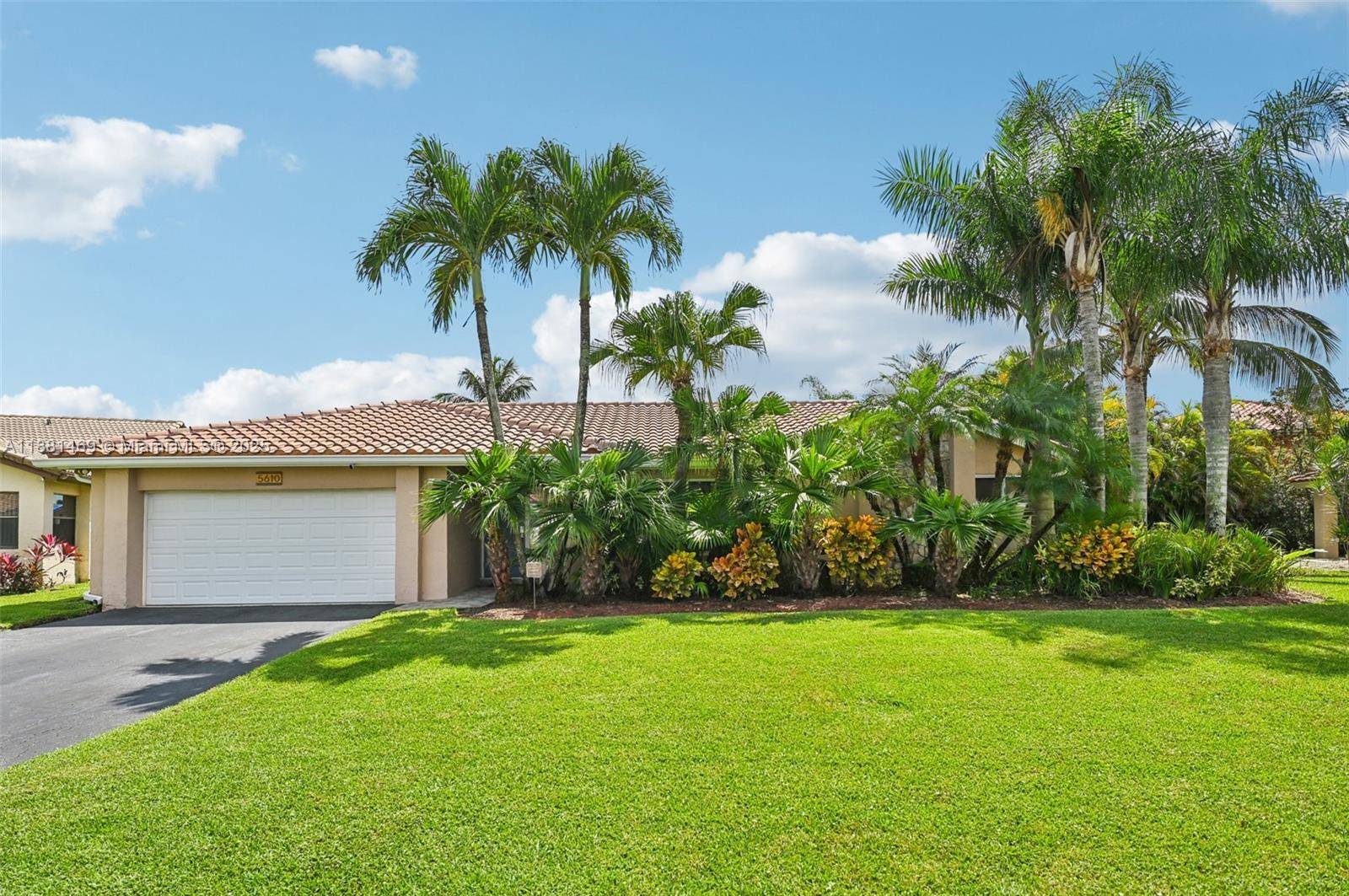 This stunning 4 bedroom, 2 bathroom pool home is situated on a serene lake in sought after West Davie.