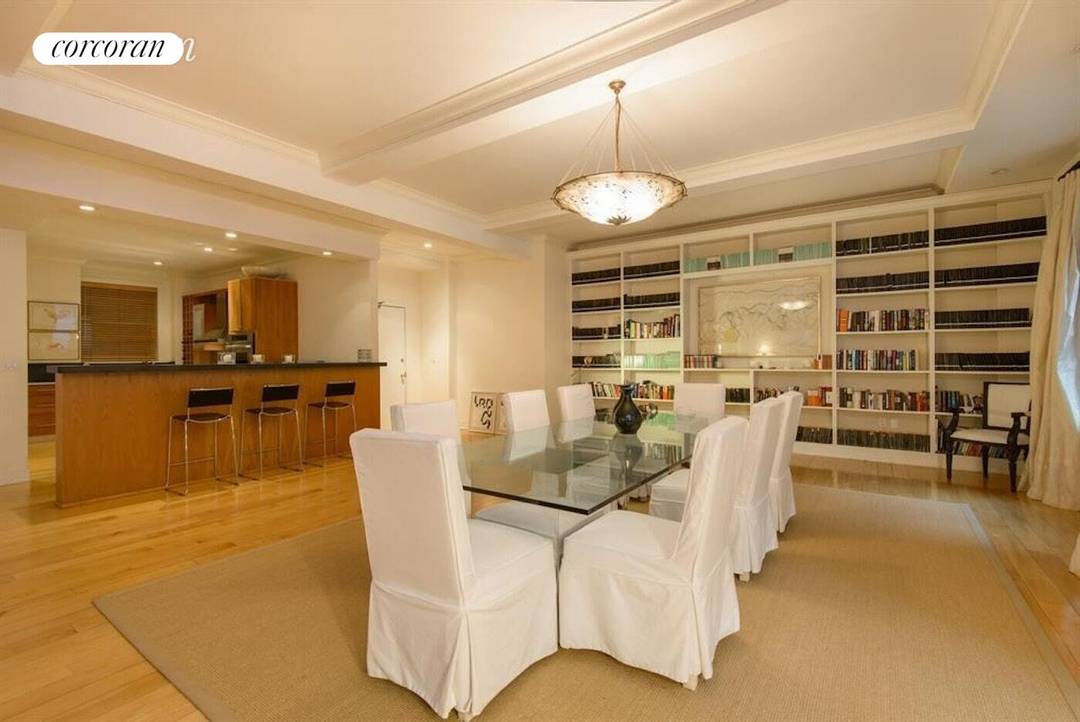 Situated on Billionaire's Row, this elegantly renovated 3 BR 3 bath Midtown West condo offers 10' ceilings, over 2700 SF of living space, amp ; generous room sizes.