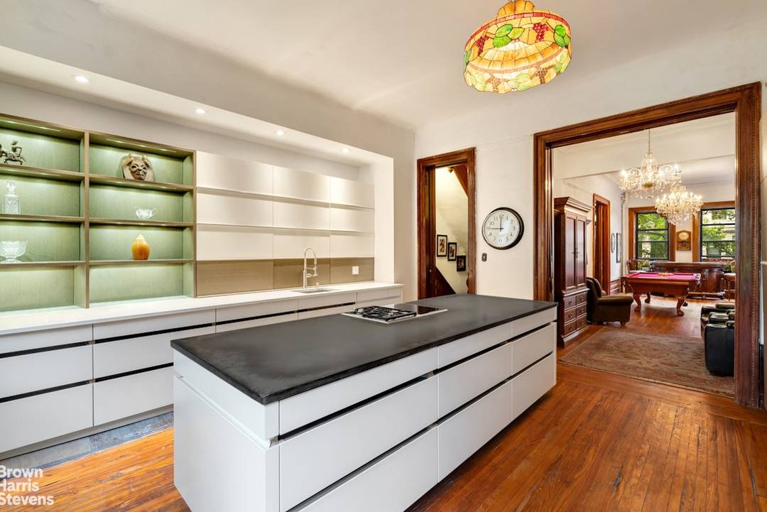 Located on one of the most charming, architecturally beautiful blocks in the coveted Jumel Terrace Historic District, 438 West 162nd Street presents a fusion of a modern renovation and original ...