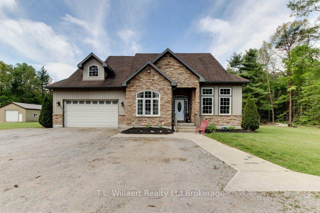 Have you been looking for a large property in Norfolk County with Big Creek flowing through it with a beautiful home ?