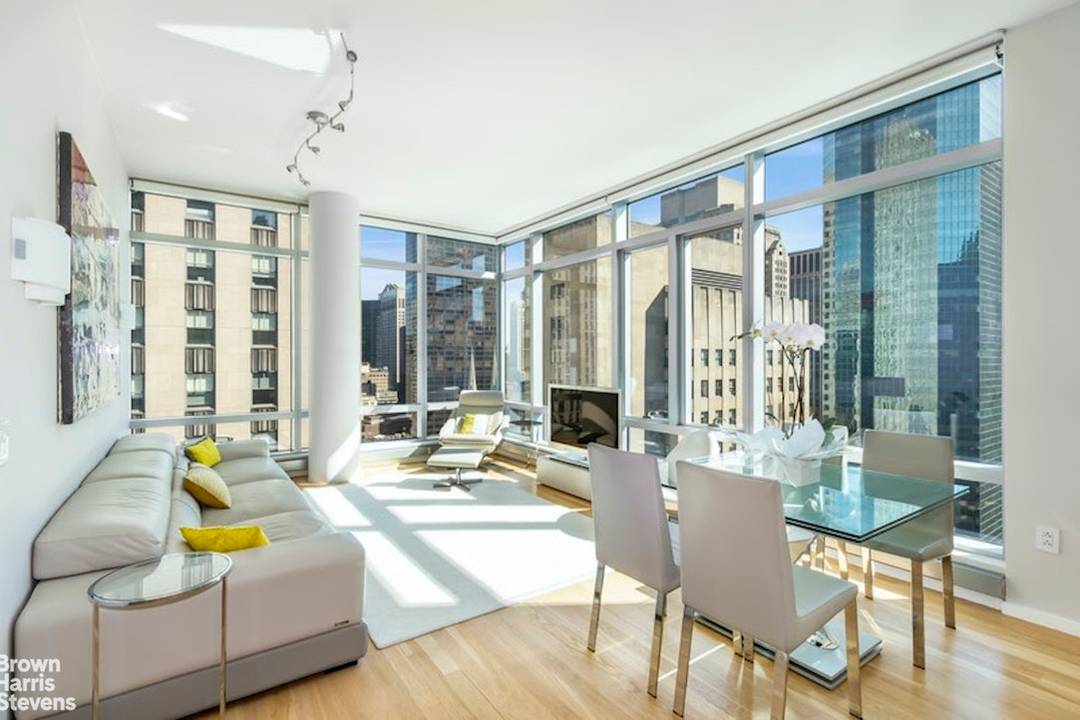 Located just off Fifth Avenue in the prestigious, full service Centria Condominium, this exceptional two bedroom home boasts 1, 266 square feet, floor to ceiling windows, and exciting views of ...
