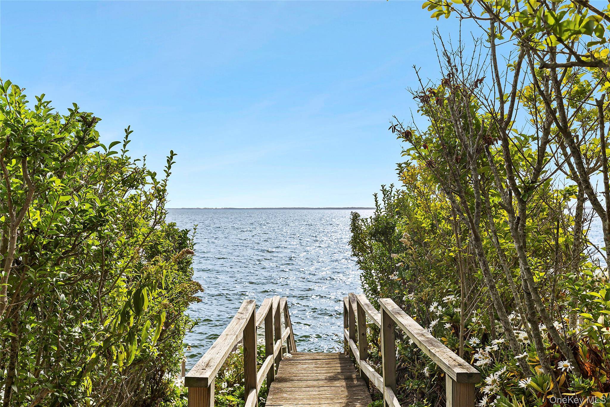 Here s your opportunity to own a charming beach cottage nestled on a quarter acre lot in Laurel.