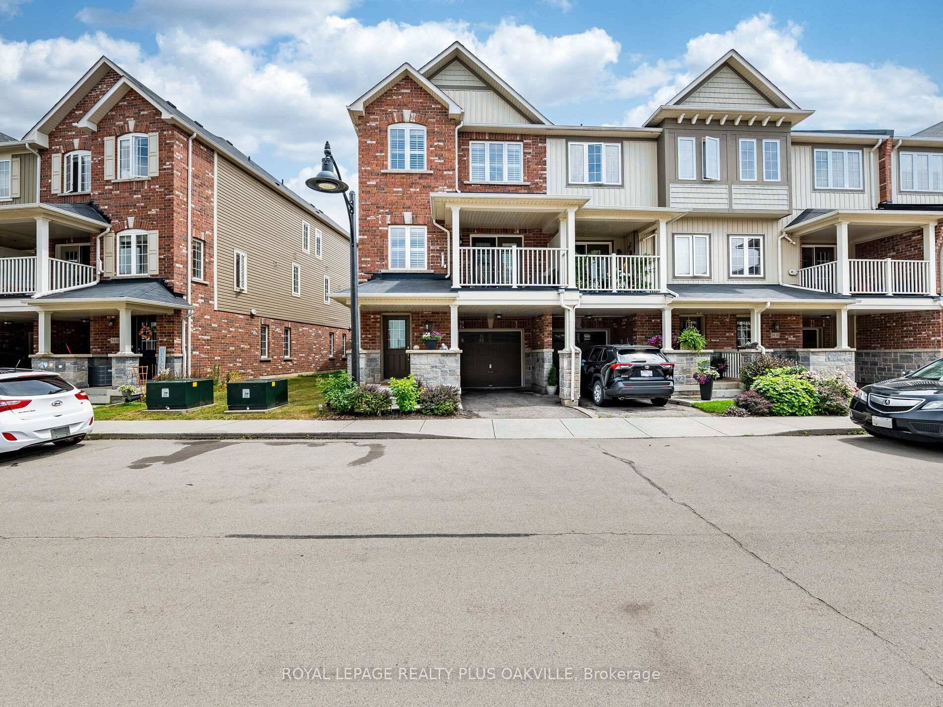 Welcome To This Stunning 3 Story Townhome Located In The Charming Community Of Waterdown.