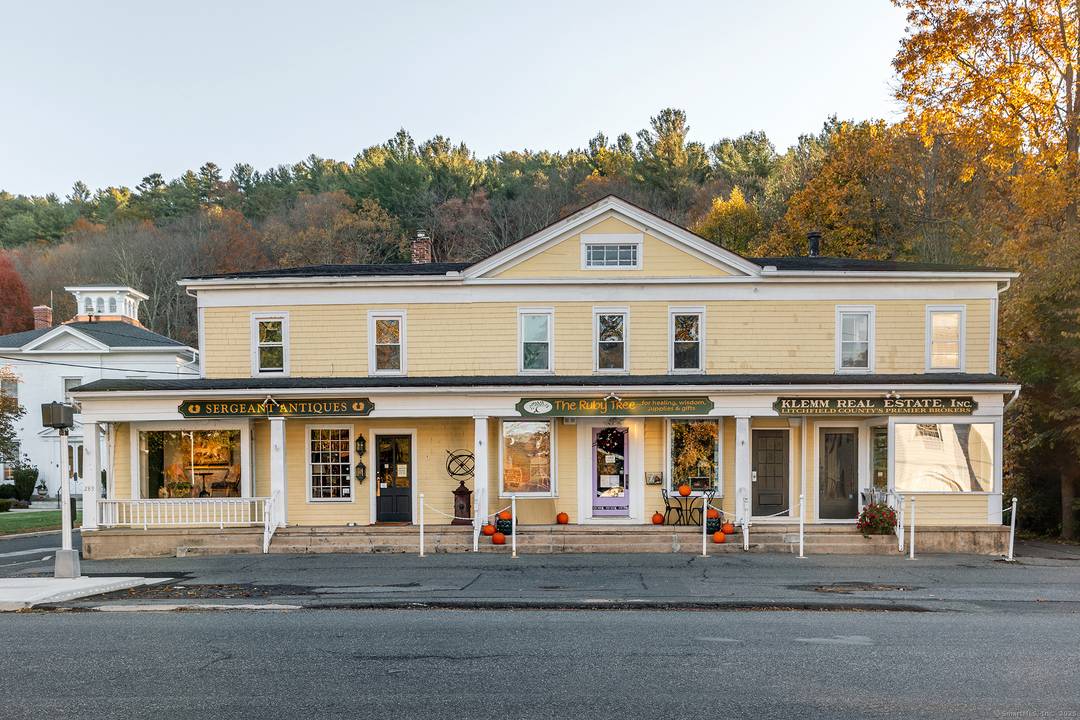 The iconic Lewis Building is in a prime location at the intersection of Rt 6 and Rt 317, next to the town office buildings and library.