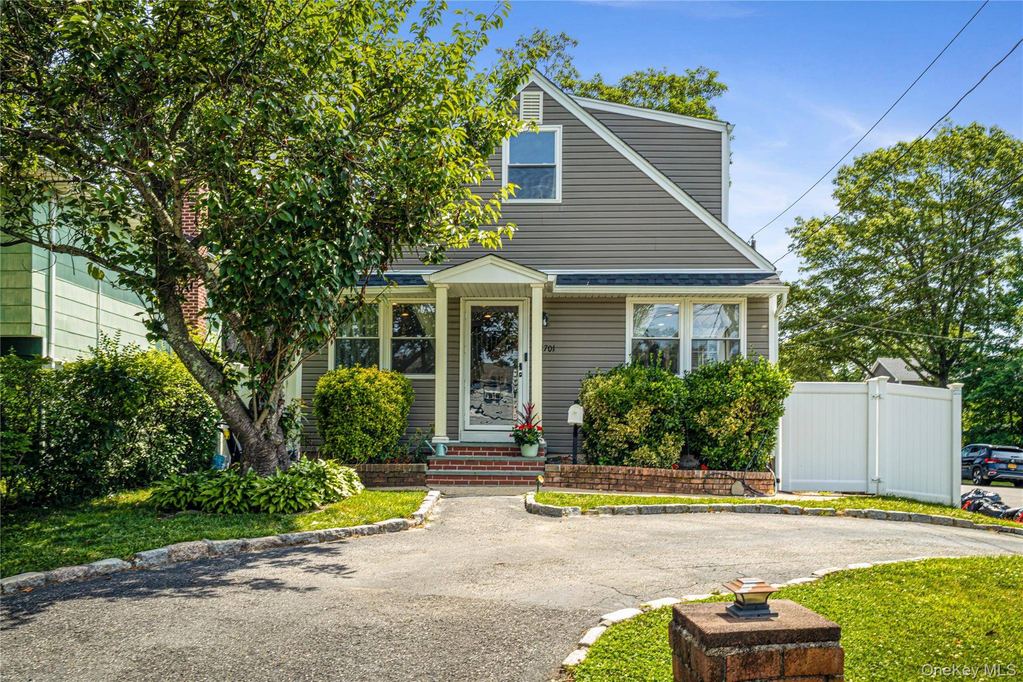 Welcome home to this charming and move in ready 4 bedroom, 2 bath cape style residence, ideally situated on a spacious corner lot in the West Babylon School District.