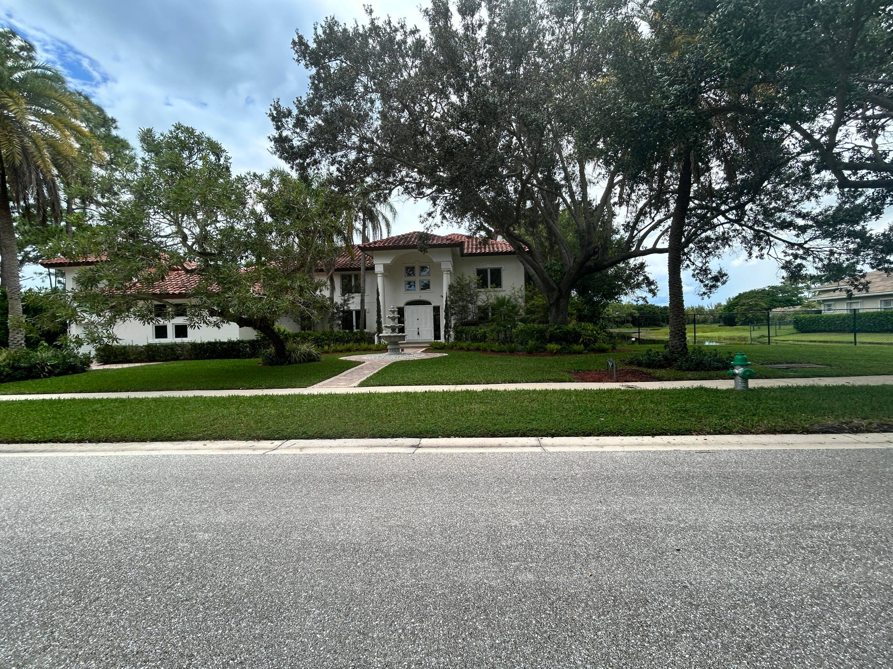 Live the Ibis Country Club lifestyle in this waterfront estate.