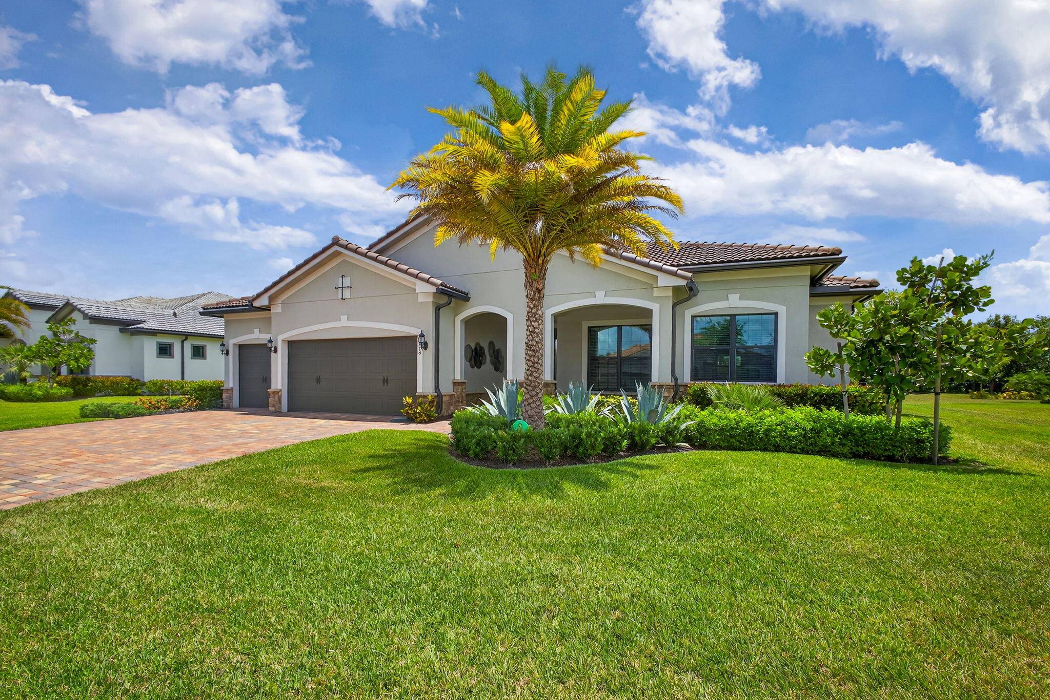 Unparalleled Elegance in this 2022, 4 Bedroom, 3 Bathroom with Den Office Home on a Large Spacious Lot in the Prestigious Ancient Tree Community.
