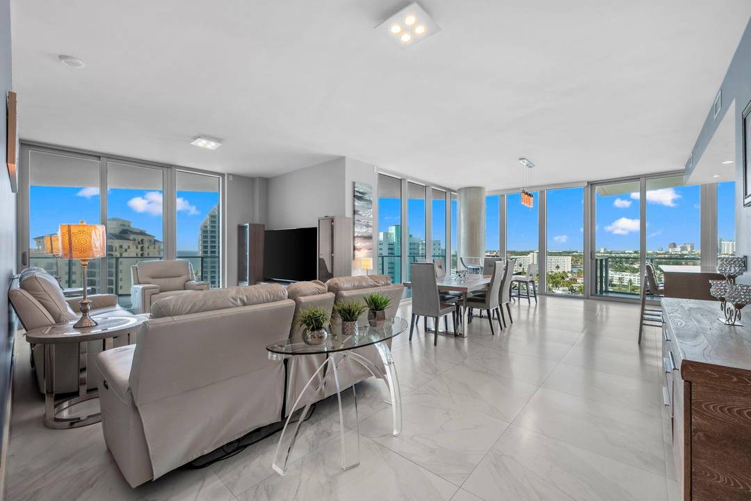 Command the Very Best Ocean, Intracoastal, and City views from this rare highest floor SW CORNER residence available, where soaring ceilings and a private foyer entrance create true exclusivity.