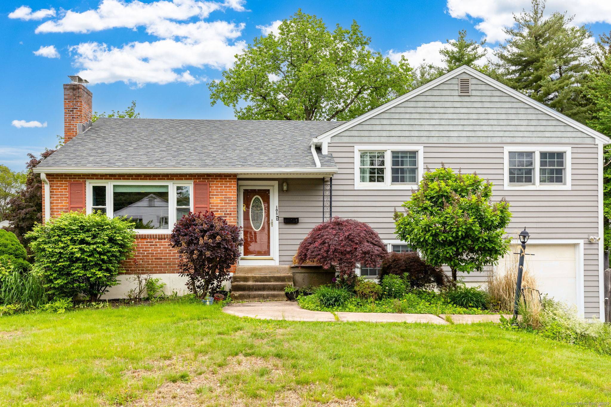 Located directly across from Aiken Elementary School, this beautifully updated split level home blends everyday function with inviting style.
