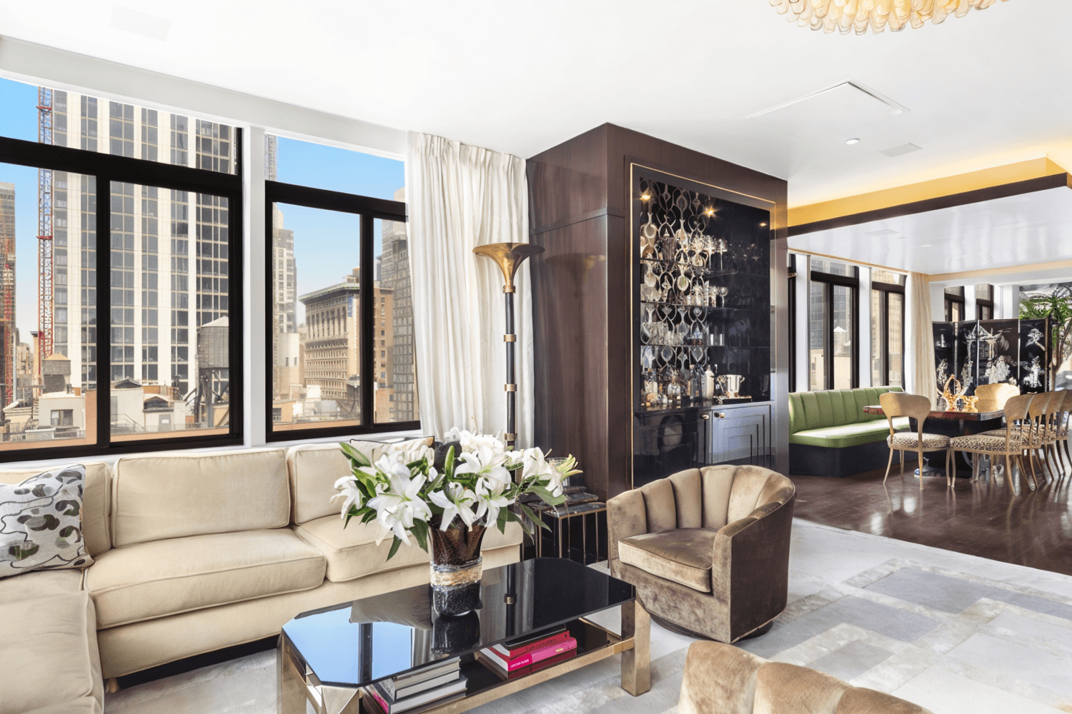 TOWNHOUSE IN A FULL SERVICE PREWAR CONDO This brilliant 4, 412 square foot quadruplex penthouse with 1, 975 square feet of outdoor space across seven terraces was designed to optimize ...