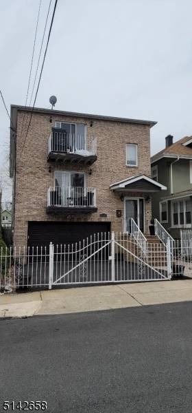 Spectacular two family home featuring central air conditioning, a main bedroom with a walk in closet, and a private full bathroom.