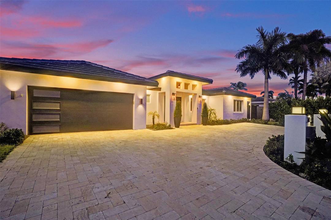 Beautifully Reimagined Waterfront Residence in Coral Ridge with No Fixed Bridges and Direct Ocean Access.