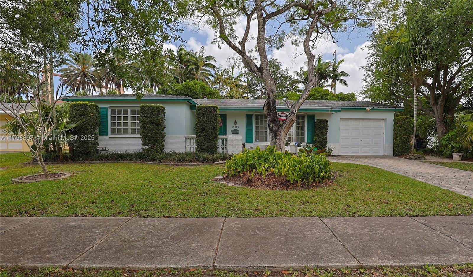 A canopy of mature trees welcomes you to this Charming 3 bedroom, 2 bath home on a quiet Cul de Sac located in the sought after Village of Kendale.