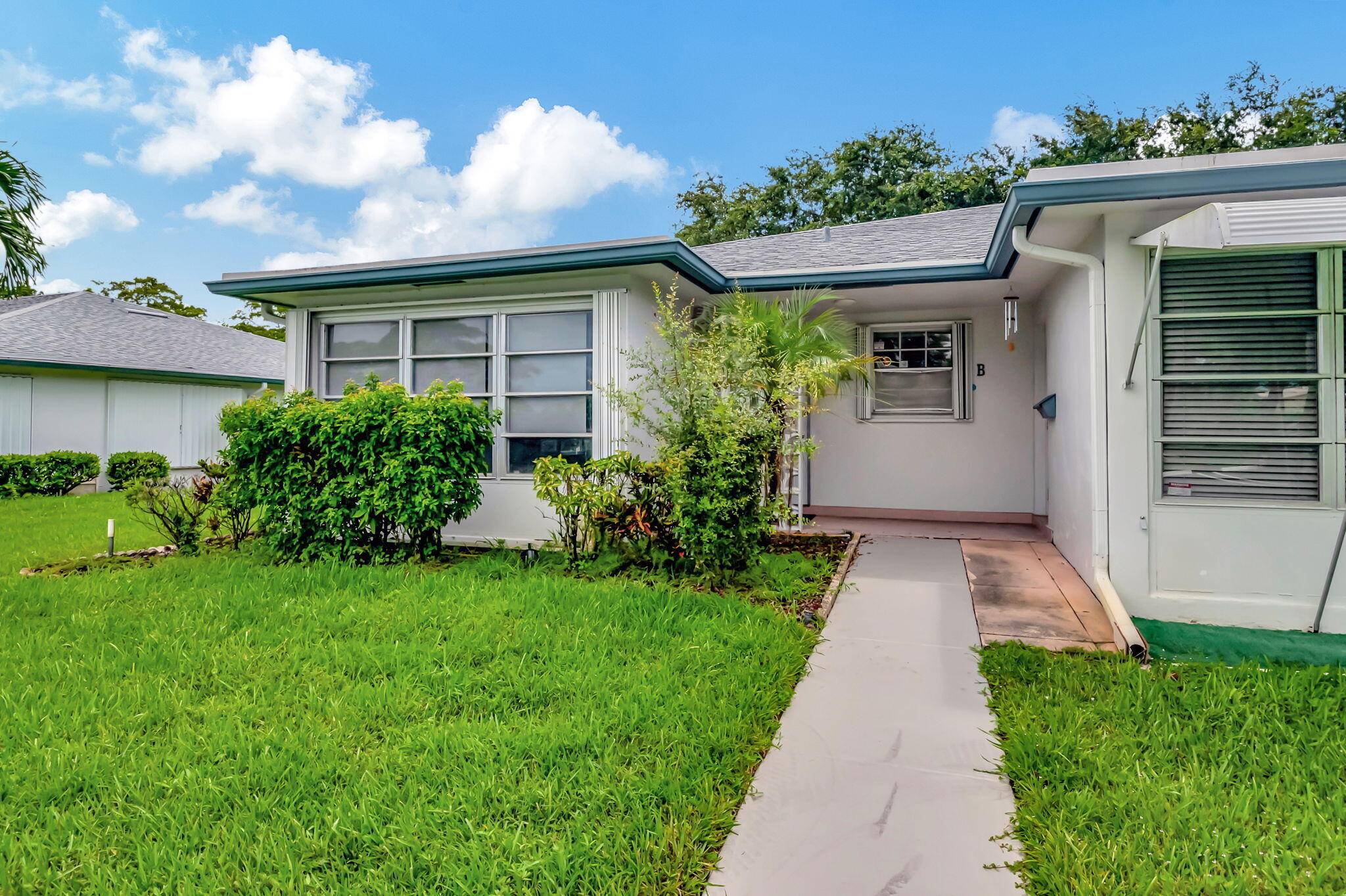 Step into this stunning 2 bedroom, 2 bath villa, where modern elegance meets comfortable living.