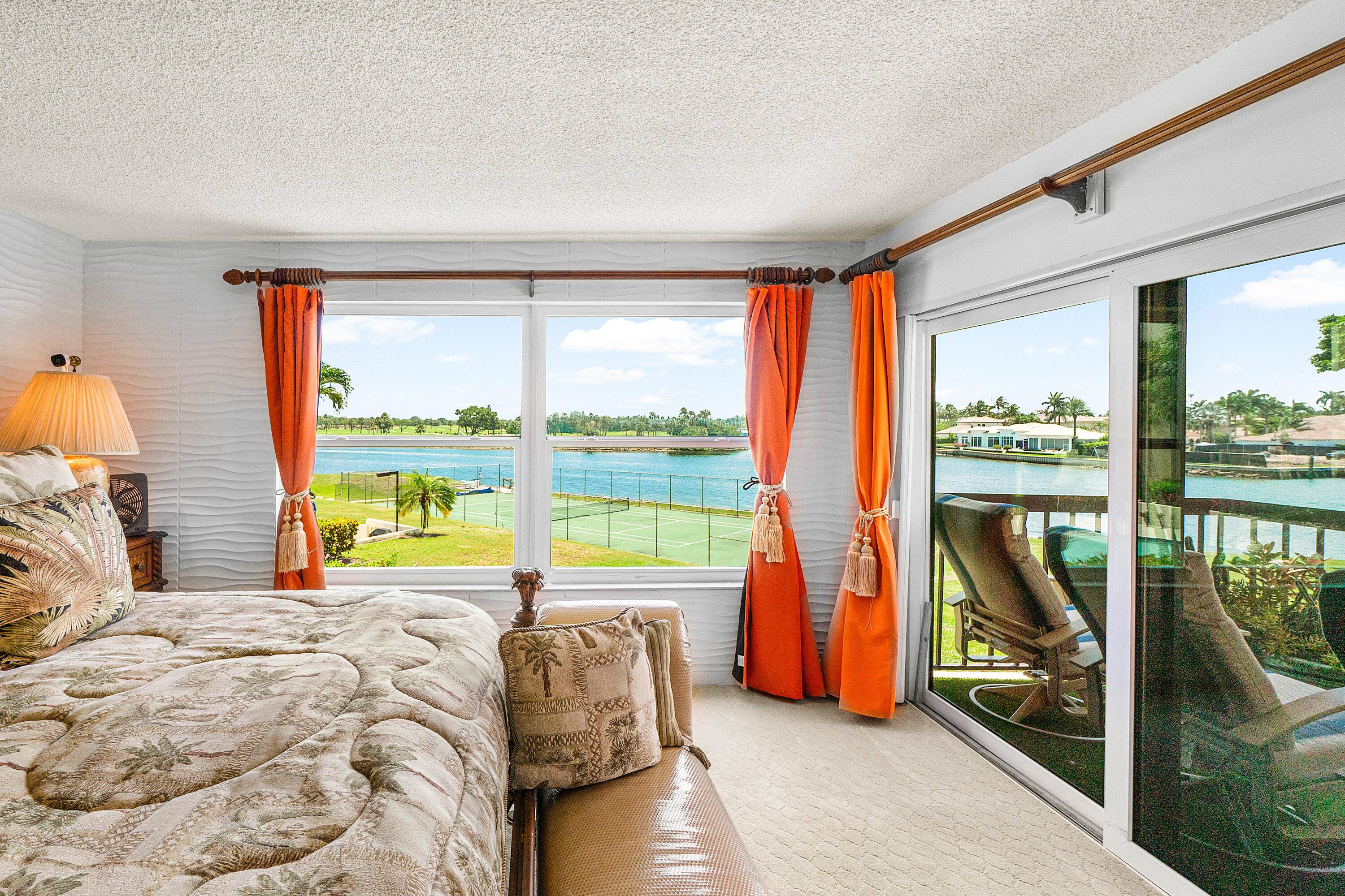 Welcome to this beautiful waterfront corner residence in the heart of North Palm Beach, where boating, golf, and coastal charm set the scene for everyday living.