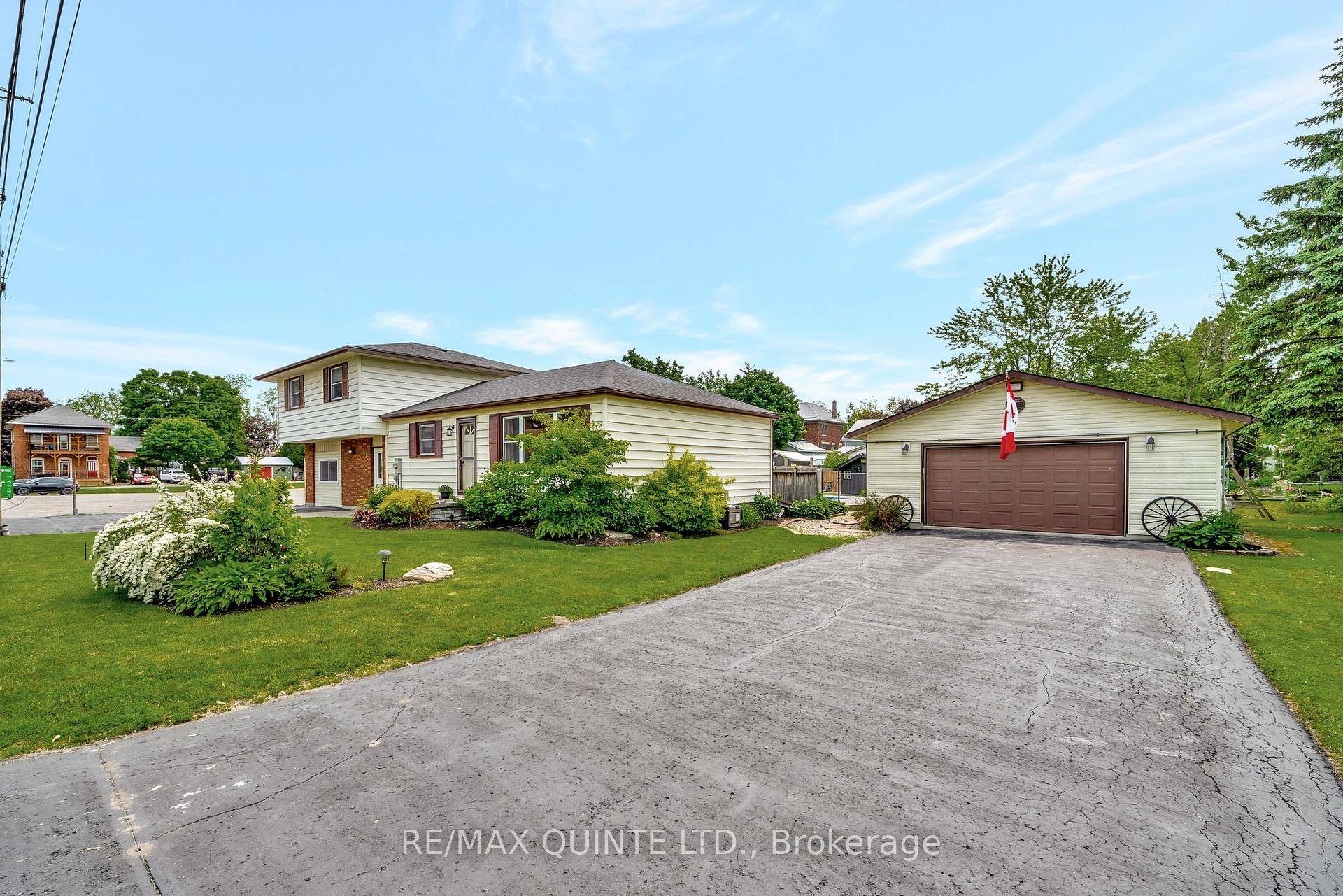 Welcome to this stunning, fully renovated home in the heart of Stirling, set on a rare double lot with a heated inground pool and detached garagewith two separate driveways.