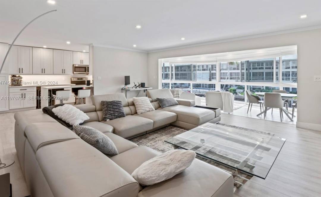 Boutique waterfront living at The Windsor, charming 30 unit deep water community in the desirable Coral Ridge Country Club area.