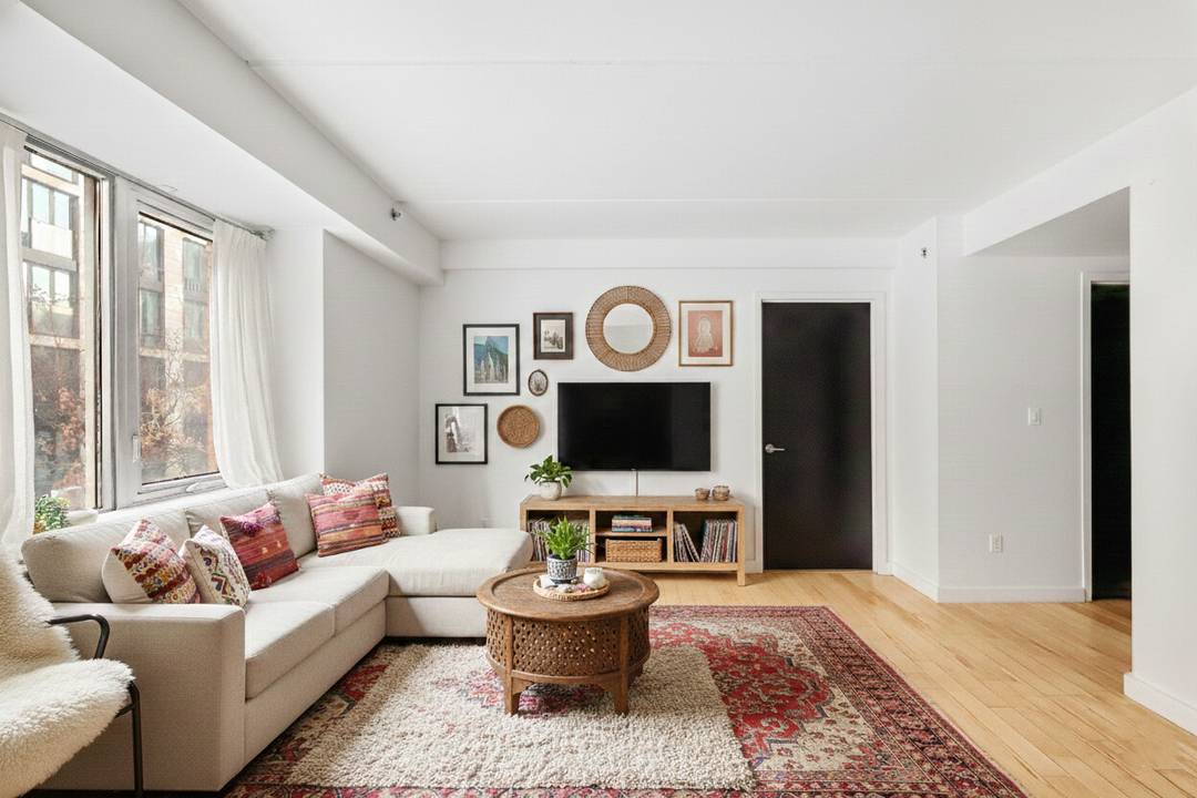Welcome to Residence B2B, a three bedroom, one bath condominium in The Art House, a full service East Harlem luxury building.