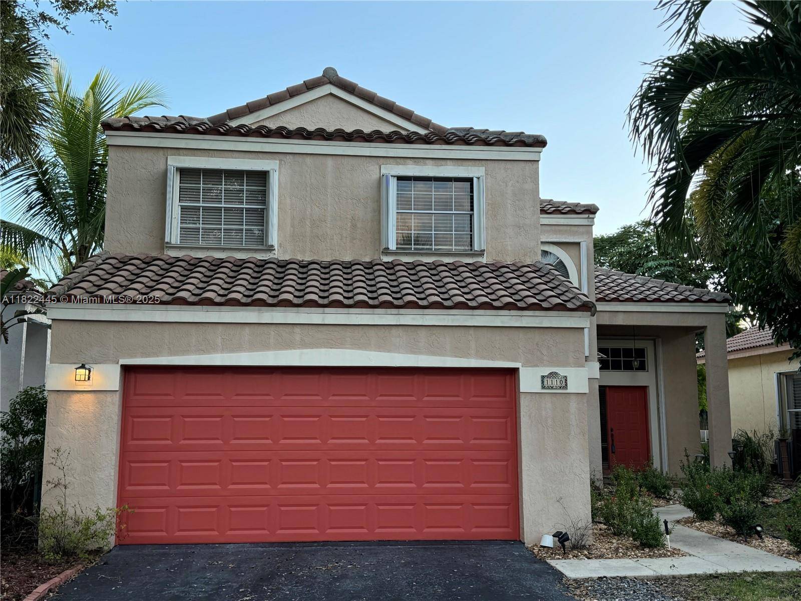Large, bright 4 bedroom 2 1 2 bath two story home with vaulted ceilings, updated kitchen and 2 car garage.