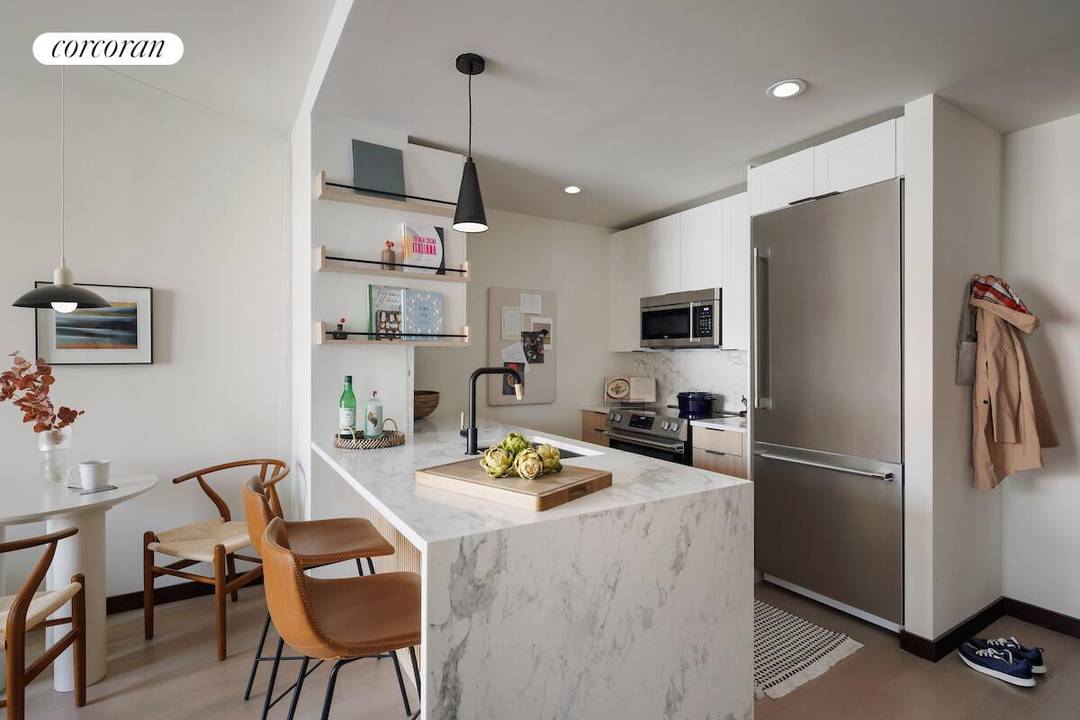 Southwestern Facing Designer one bedroom Corner unit with Park Slope streetscape and harbor views and private balcony only minutes from the F, G and R Subway lines and across from ...