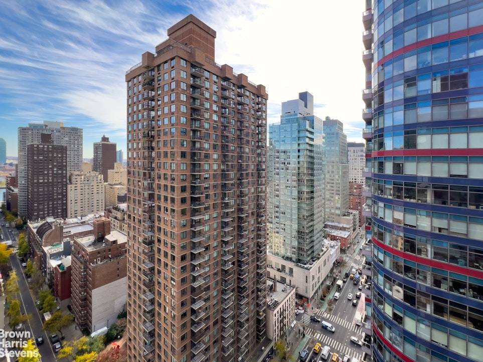 Welcome to apartment 27M, a spacious and bright corner 1 bedroom in the heart of Midtown East, offering gorgeous open views to the South and East.
