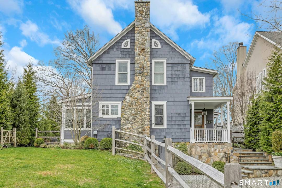 Welcome to 7 Thomes Street, a charming home set on one of Rowayton's quiet, picturesque streets.