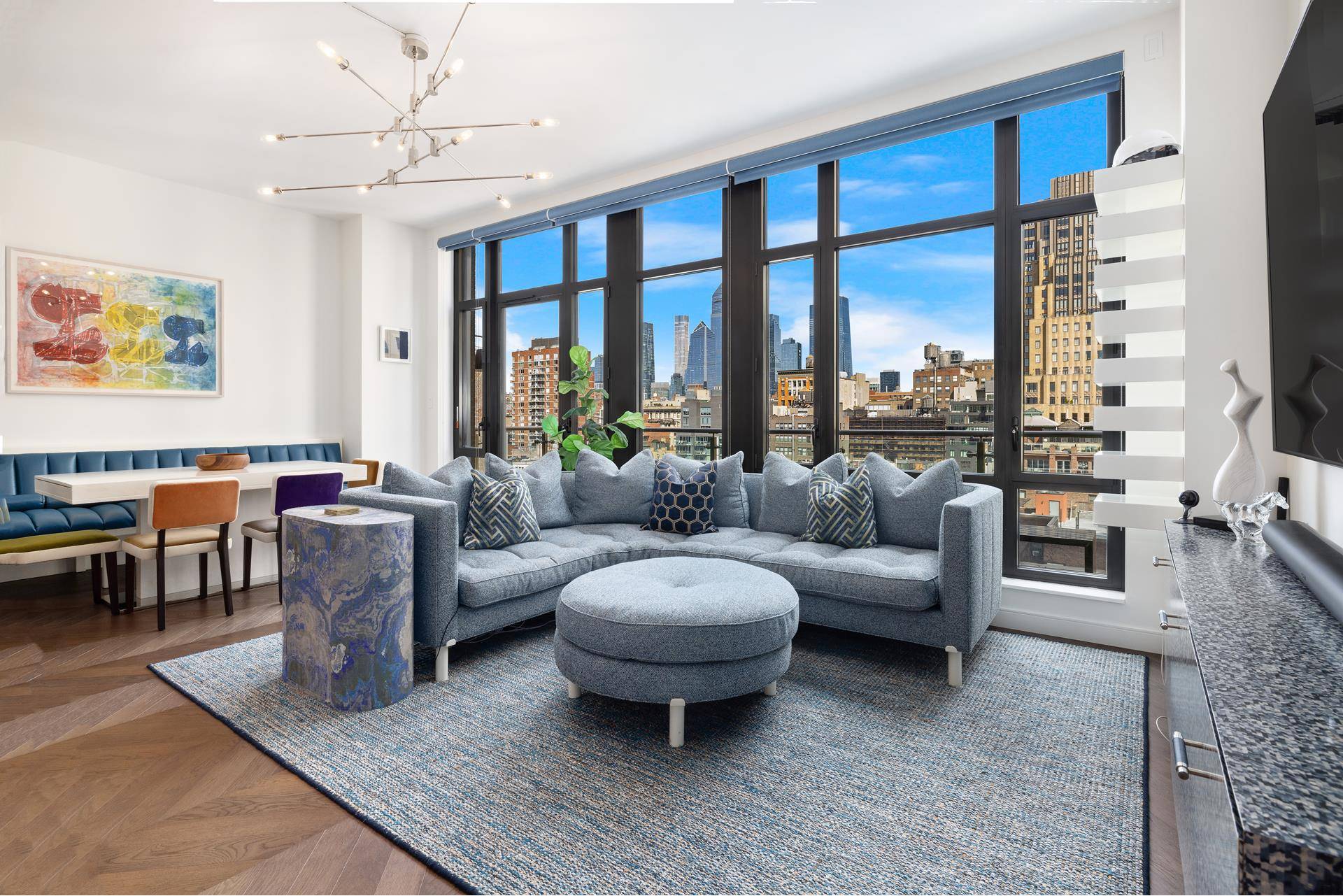 This 1402 square foot two bedroom, two bath plus powder room is bathed in northern light from dramatic oversized divided light windows.