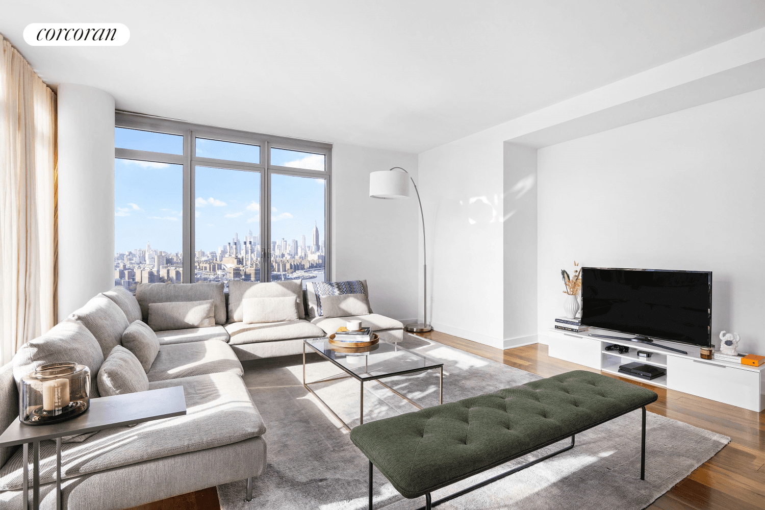 Iconic Midtown and Williamsburg Bridge Views from this expansive 1, 376 SF, sun filled corner, 2 bedroom 2 bathroom rental with home office and extra large balcony at 2 Northside ...