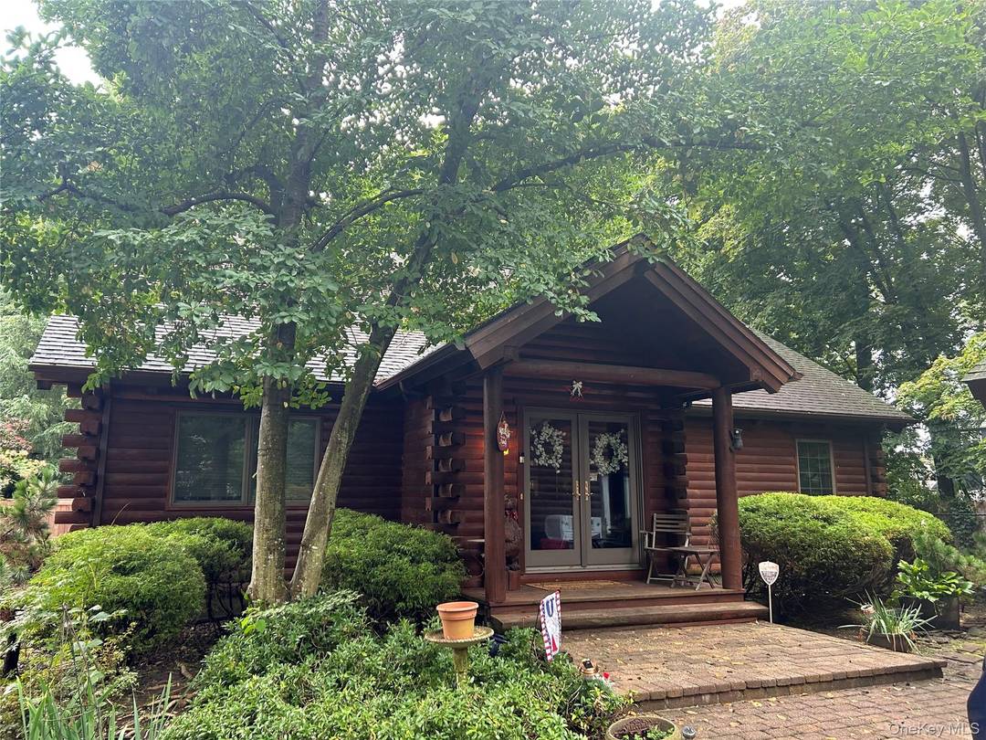 THIS IS YOUR OPPORTUNITY TO OWN A BEAUTIFUL CUSTOM BUILT SALT BOX STYLE LOG HOME !