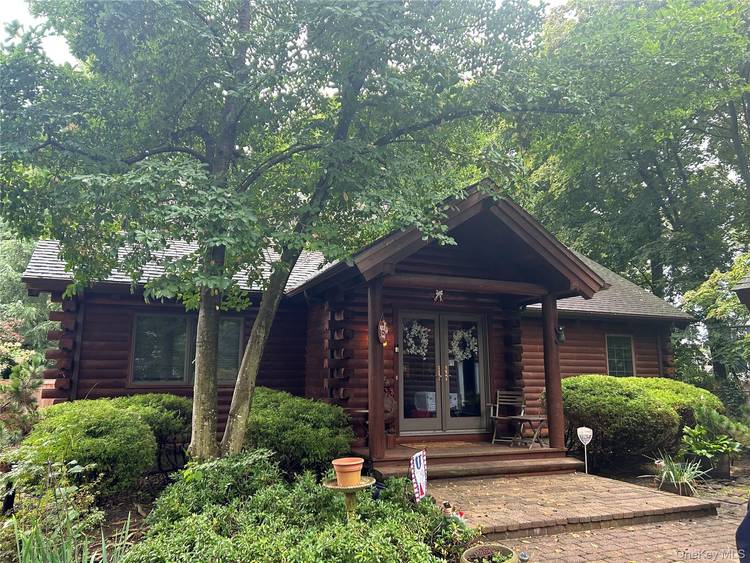 THIS IS YOUR OPPORTUNITY TO OWN A BEAUTIFUL CUSTOM BUILT SALT BOX STYLE LOG HOME !