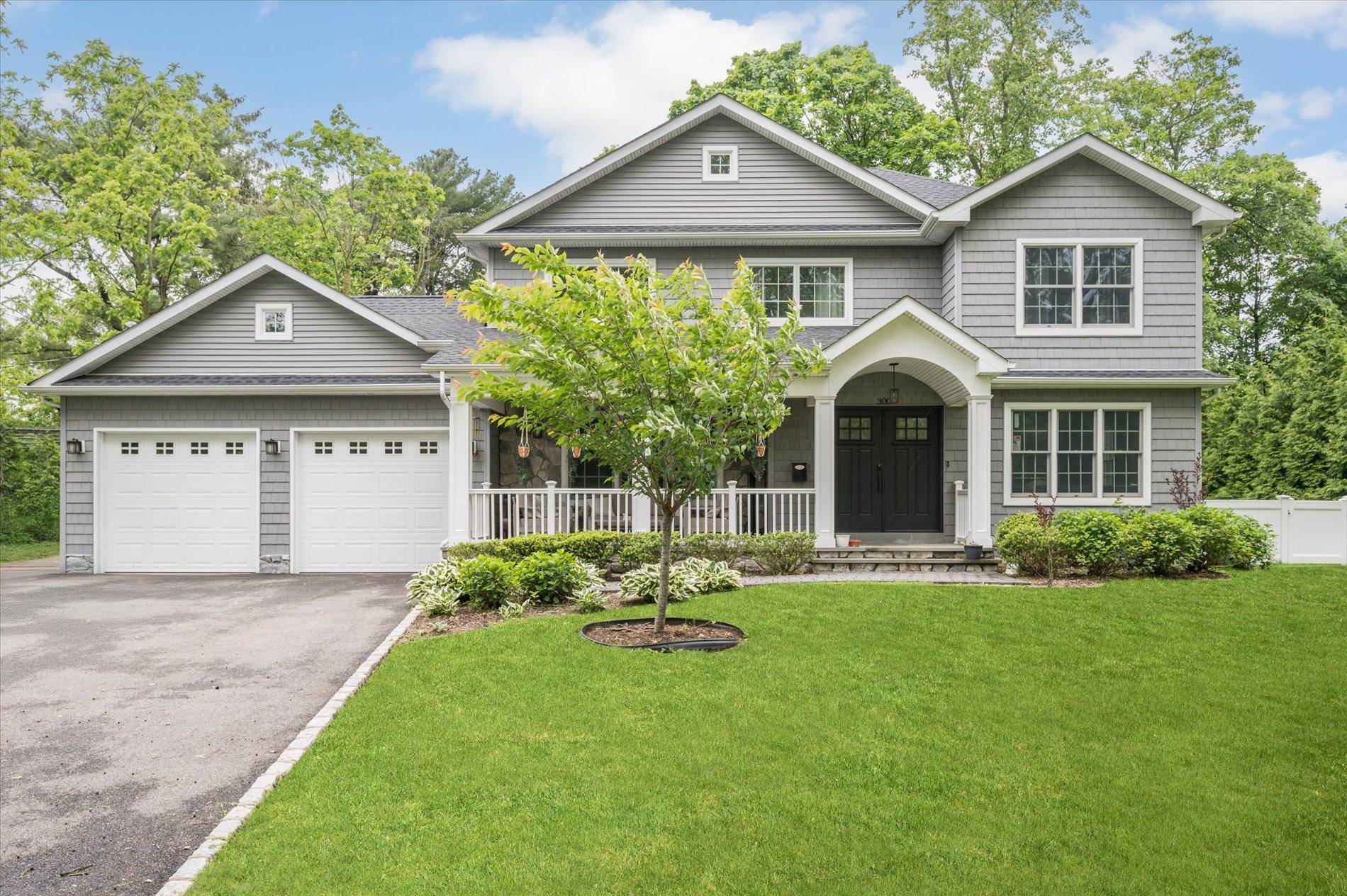 This beautifully updated Colonial offers a spacious, open concept layout with a seamless flow between the kitchen, dining room, living room, and sitting area perfect for everyday living and entertaining.