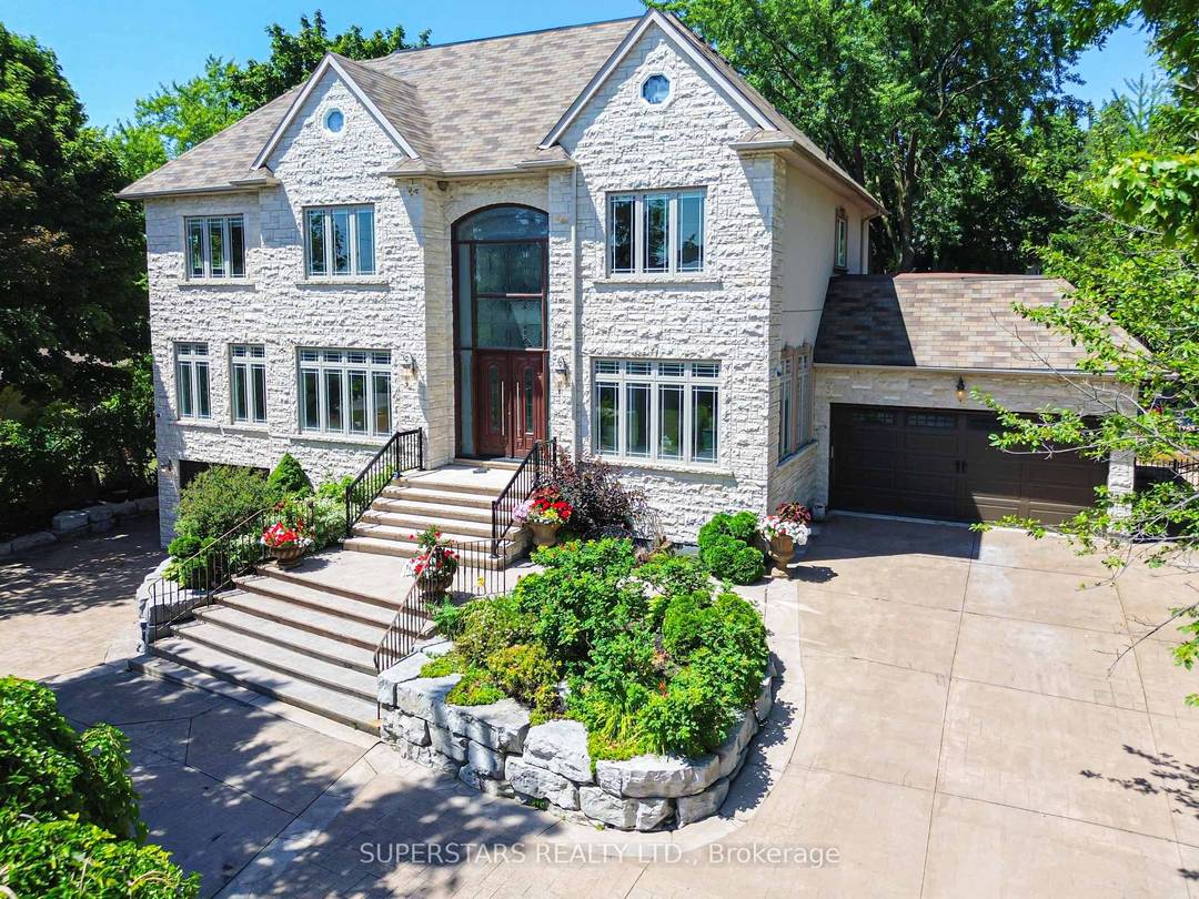 Rarely Found Custom built 3 Car Garage Detached Home Located On A Large Lot With 109 X 190.