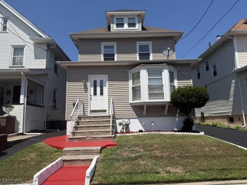 Welcome to this updated Side Hall Colonial offering comfort, charm, and recent improvements throughout.