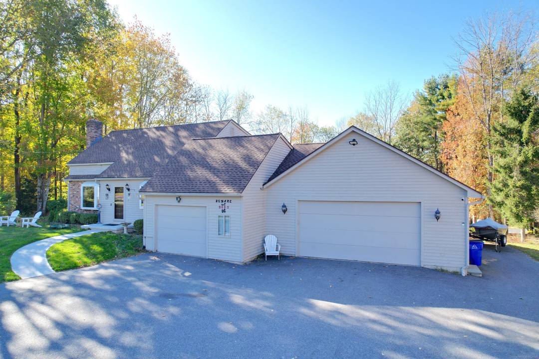 Discover the charm of this spacious contemporary Cape, set on a peaceful one acre lot in a desirable rural neighborhood.