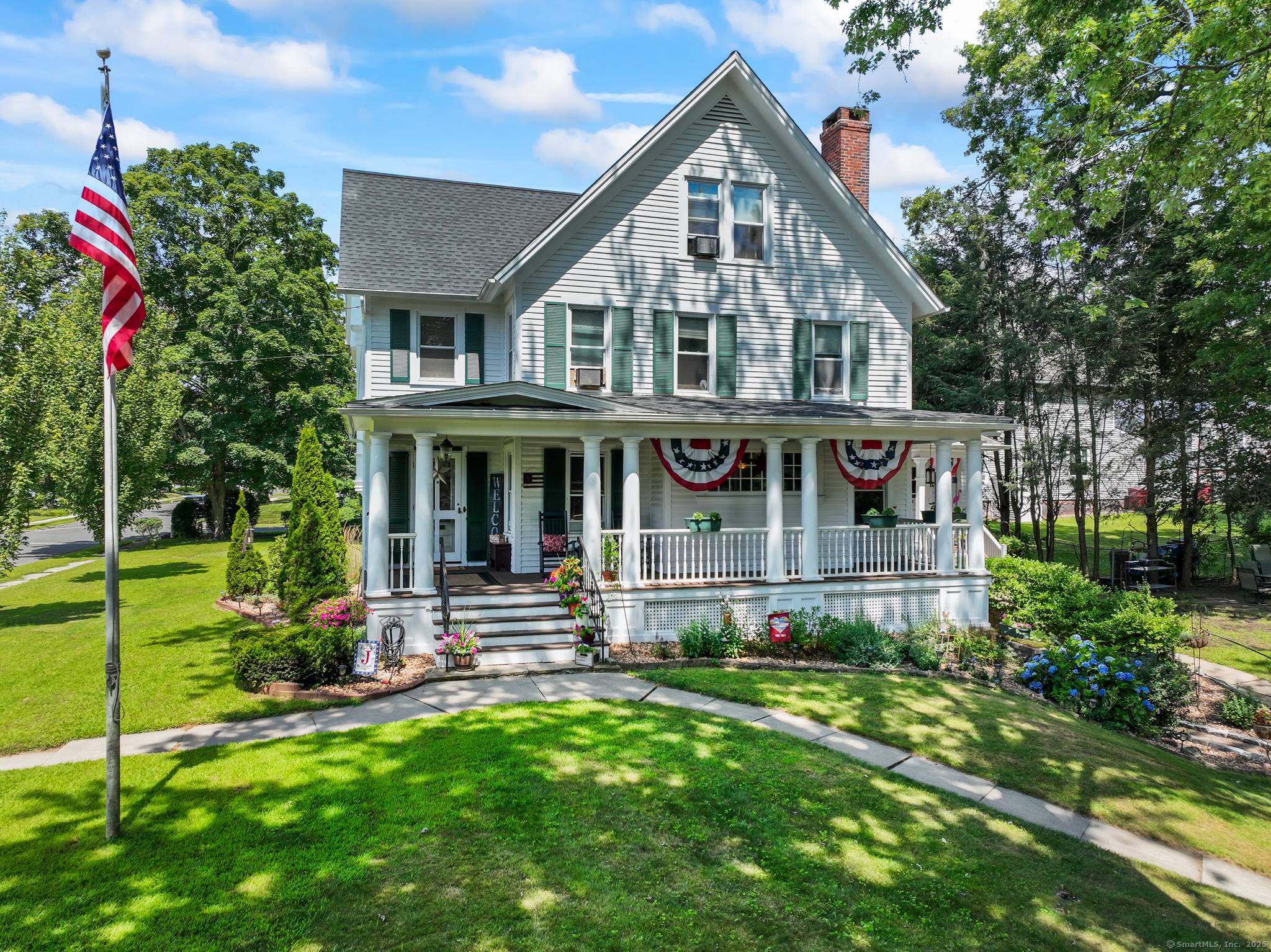 Welcome to timeless elegance in this classic colonial, perfectly situated on a generous and private 0.