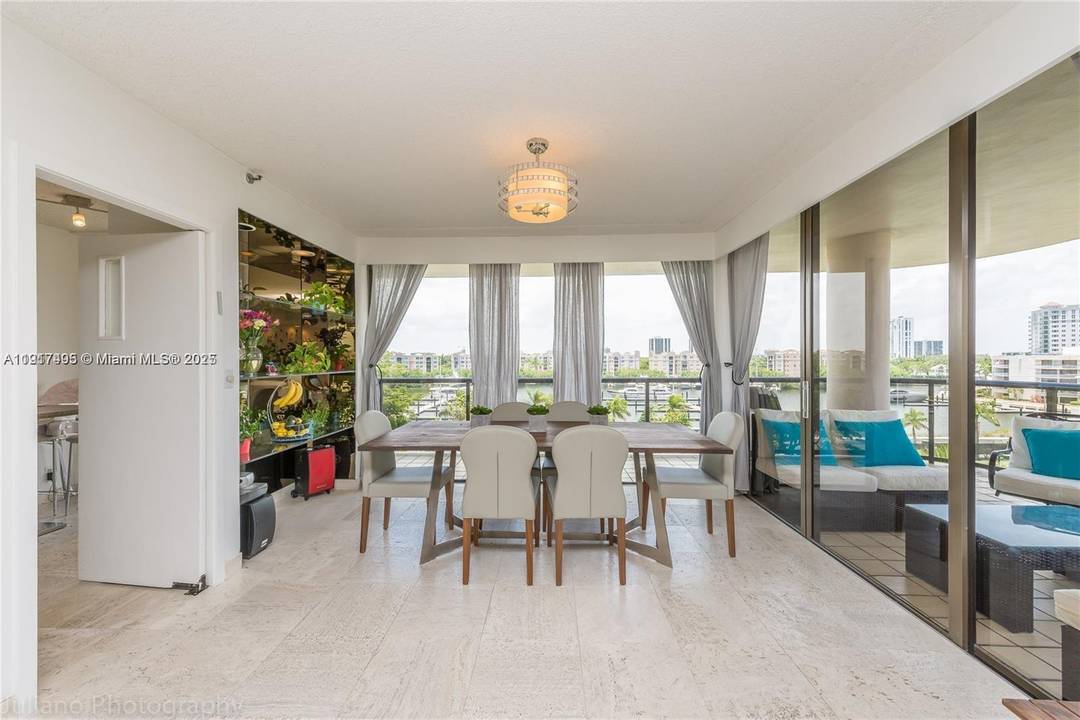 LARGER CORNER WATER VIEW UNIT IN THE MOST DESIRABLE AVENTURA AREA, GATED COMMUNITY, COVERED PARKING.