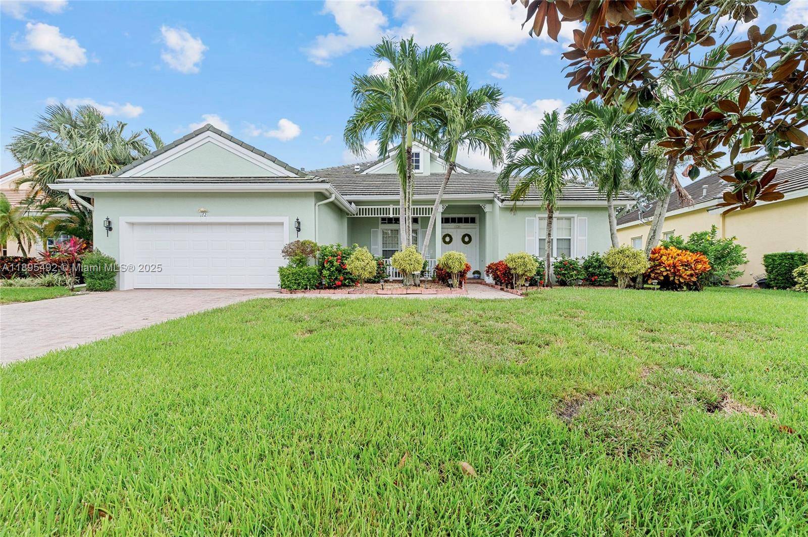 Wake up to peaceful waterfront views in this spacious 3 bedroom, 3 bath home located in the desirable Magnolia Lakes gated community of Port St.