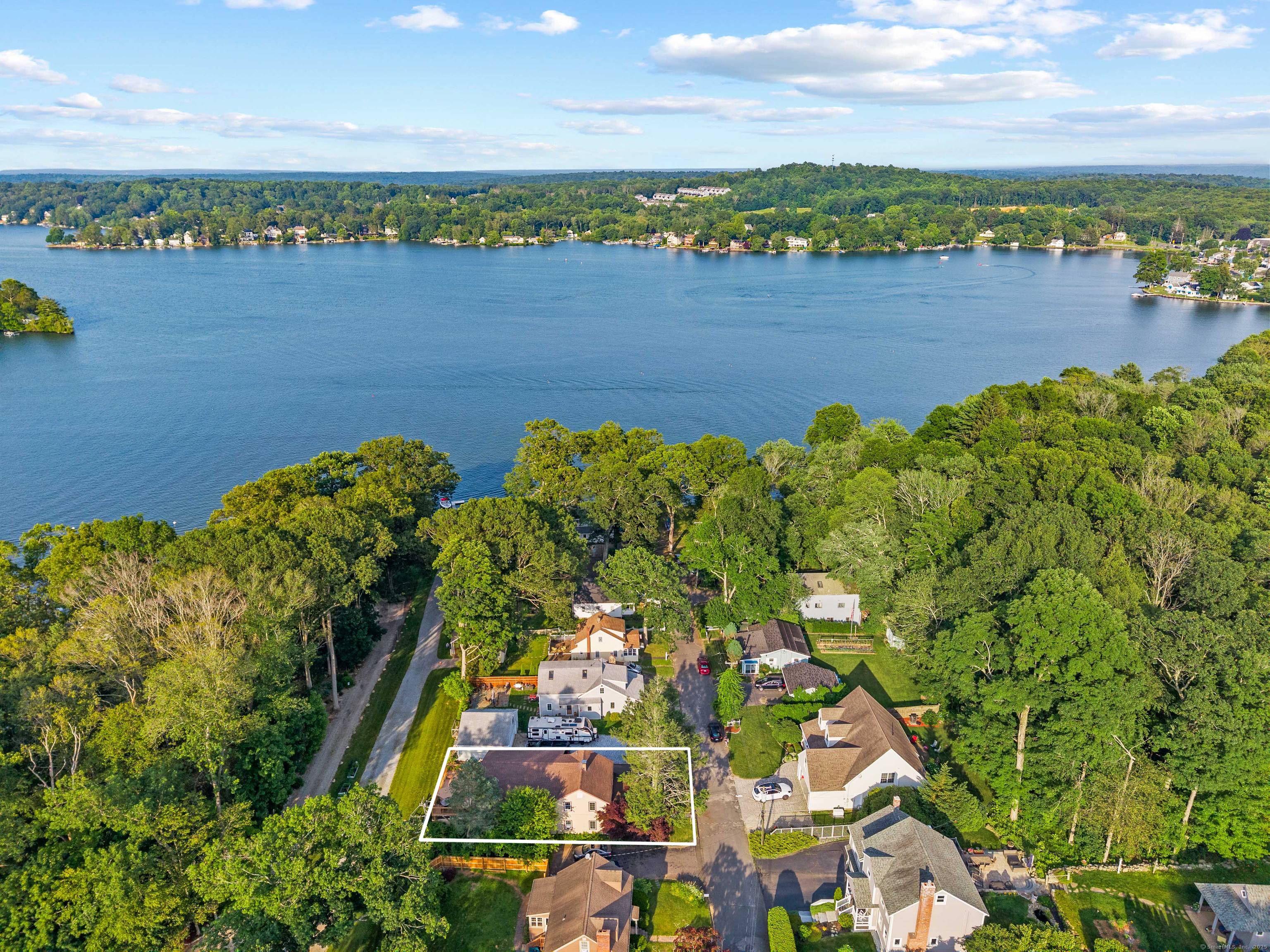 Welcome to this exquisite 4 bedroom, 2 bath lake home, ideally suited for year round living.