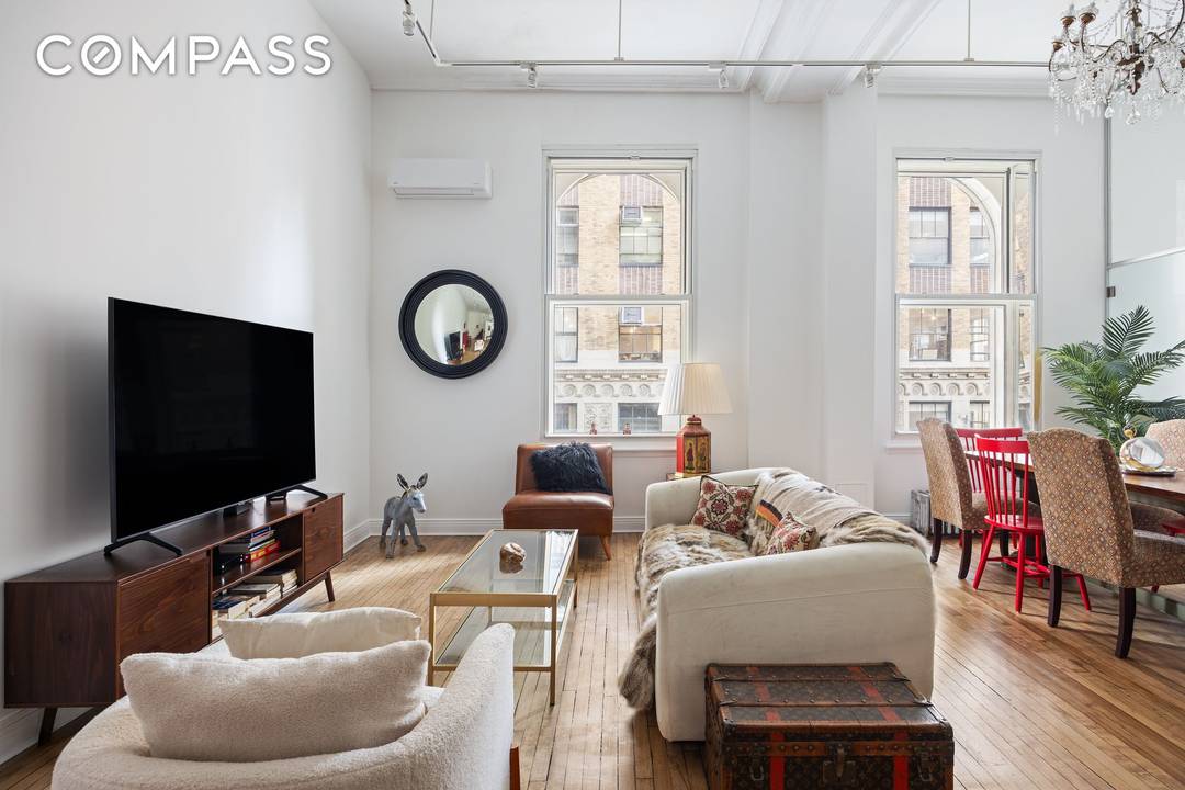 Welcome to this authentic pre war Tribeca loft condominium.